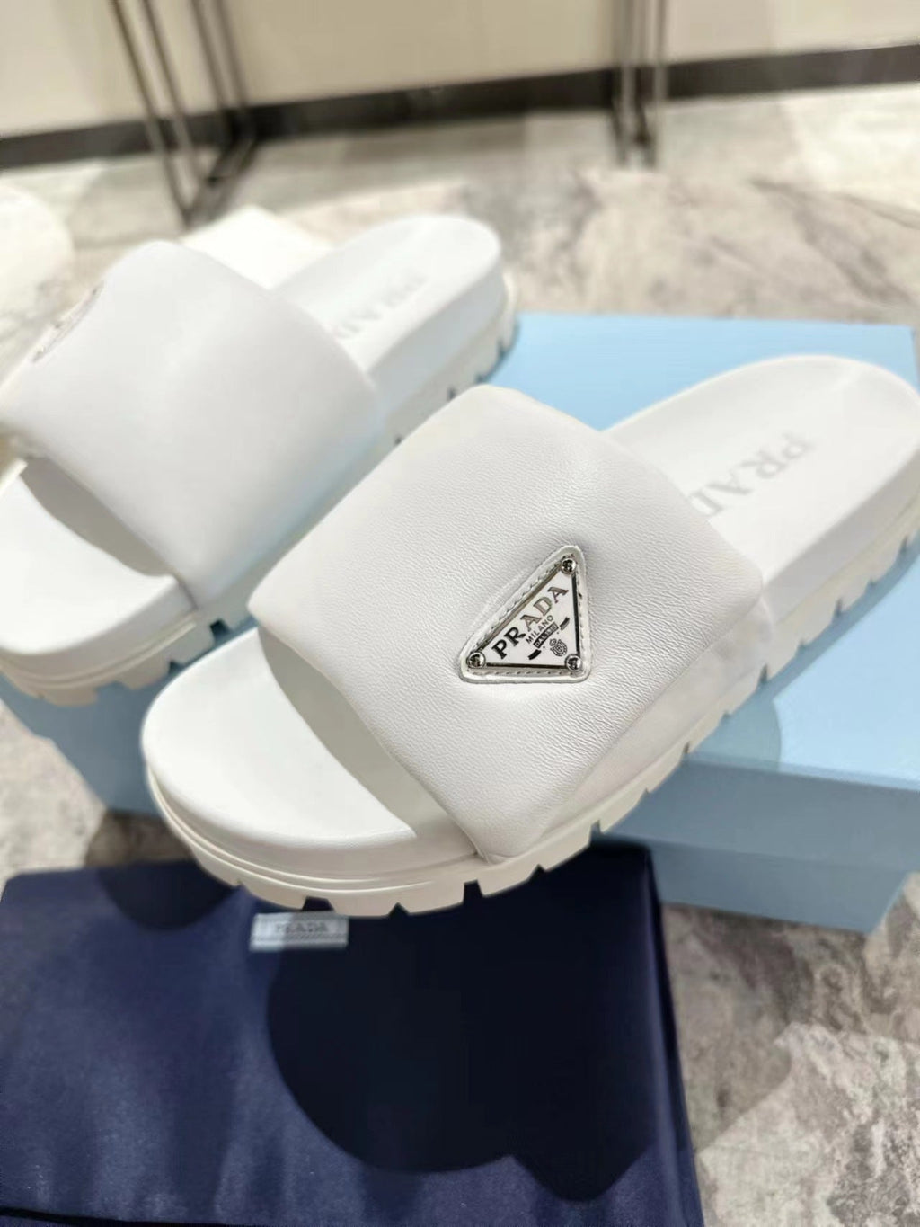 PRADA SHEARLING SLIDES WHITE LAMBSKIN