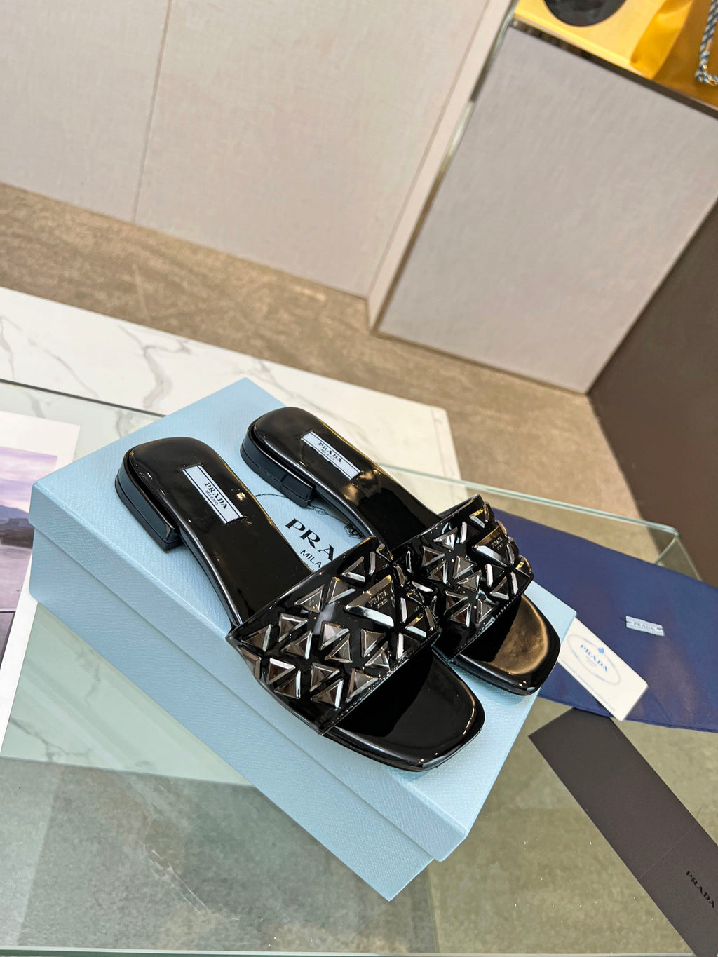 PRADA EMBROIDERED SLIDES FLAT BLACK CALFSKIN