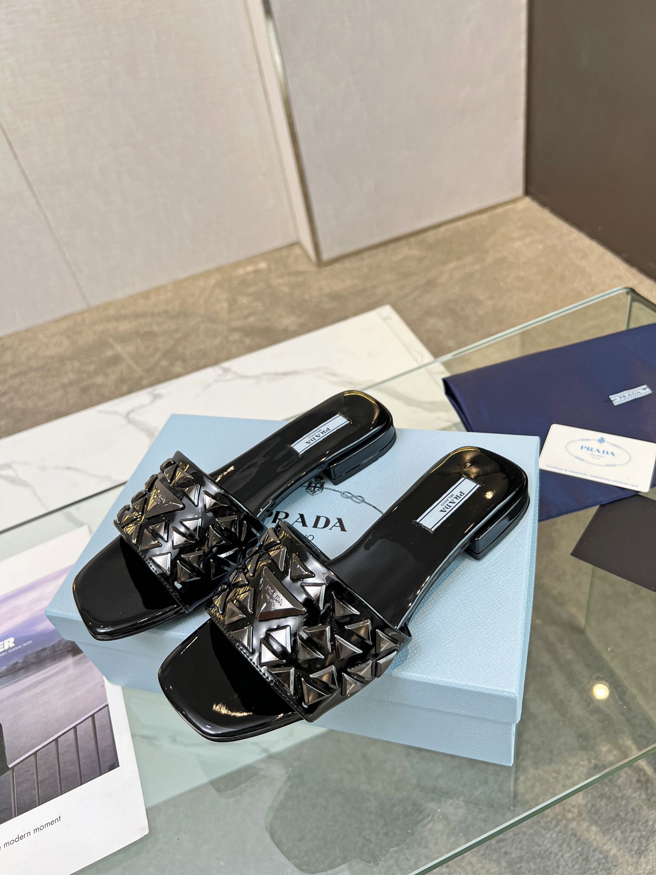 PRADA EMBROIDERED SLIDES FLAT BLACK CALFSKIN