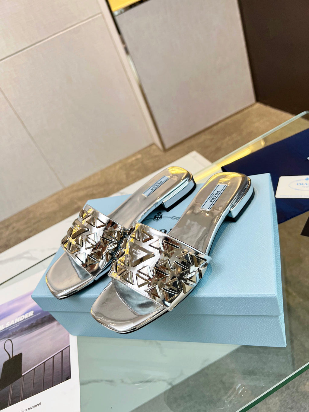 PRADA EMBROIDERED SLIDES FLAT SILVER CALFSKIN
