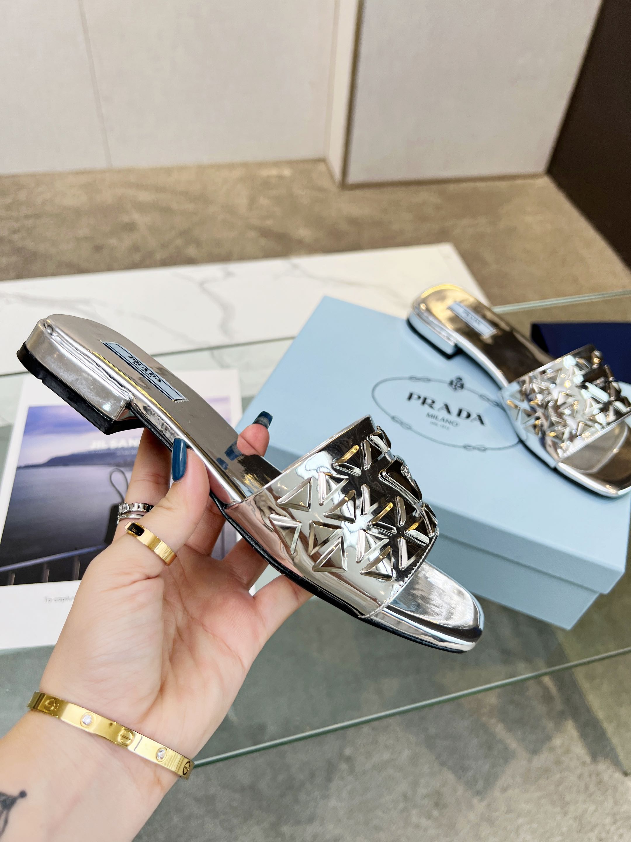 PRADA EMBROIDERED SLIDES FLAT SILVER CALFSKIN