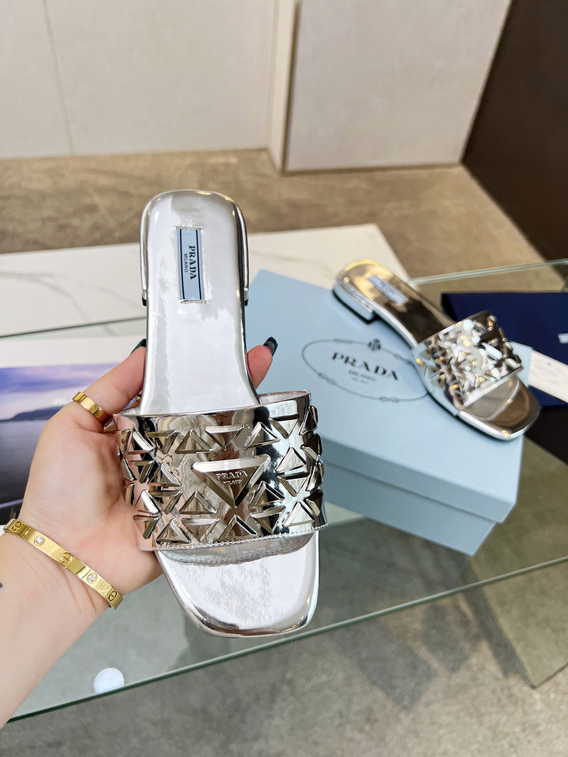 PRADA EMBROIDERED SLIDES FLAT SILVER CALFSKIN