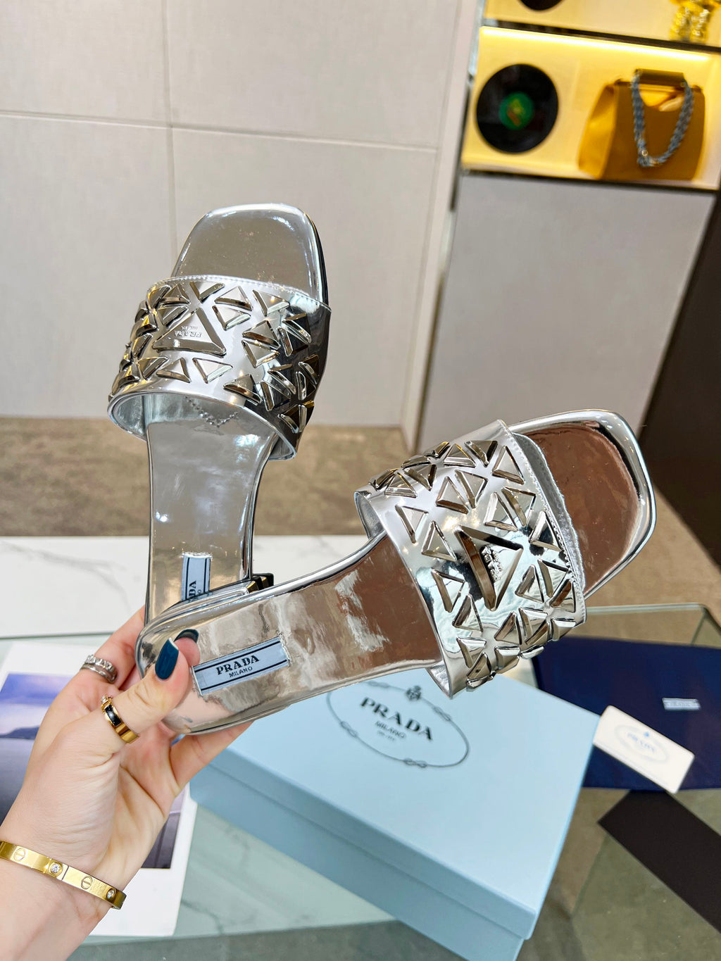 PRADA EMBROIDERED SLIDES FLAT SILVER CALFSKIN
