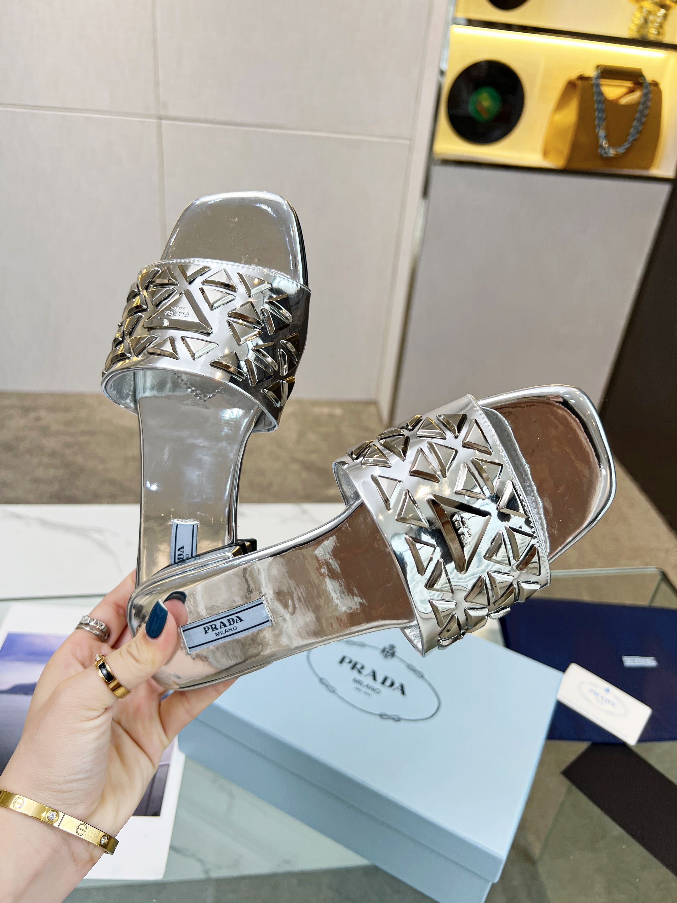 PRADA EMBROIDERED SLIDES FLAT SILVER CALFSKIN