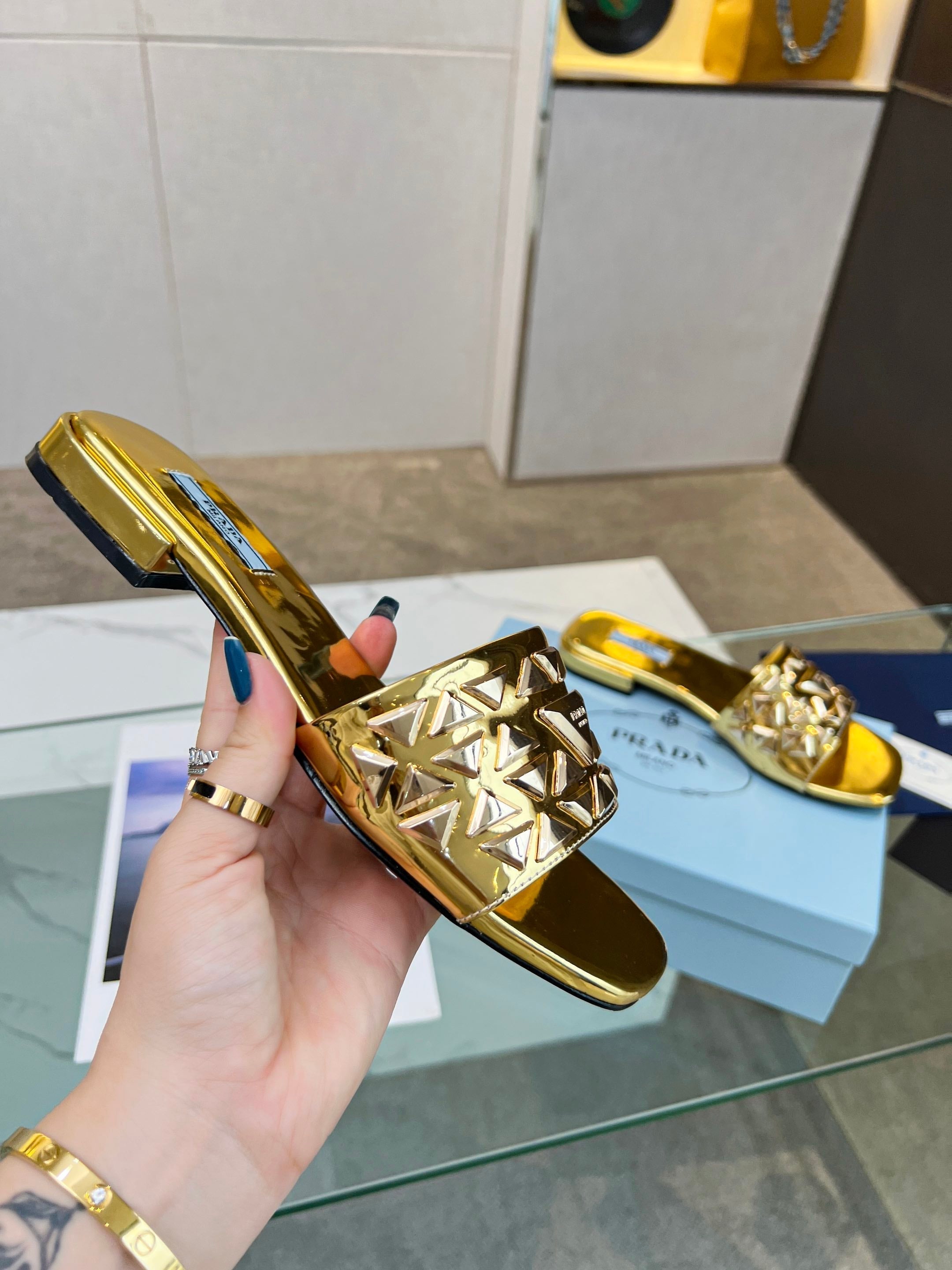 PRADA EMBROIDERED SLIDES FLAT METALLIC GOLD CALFSKIN