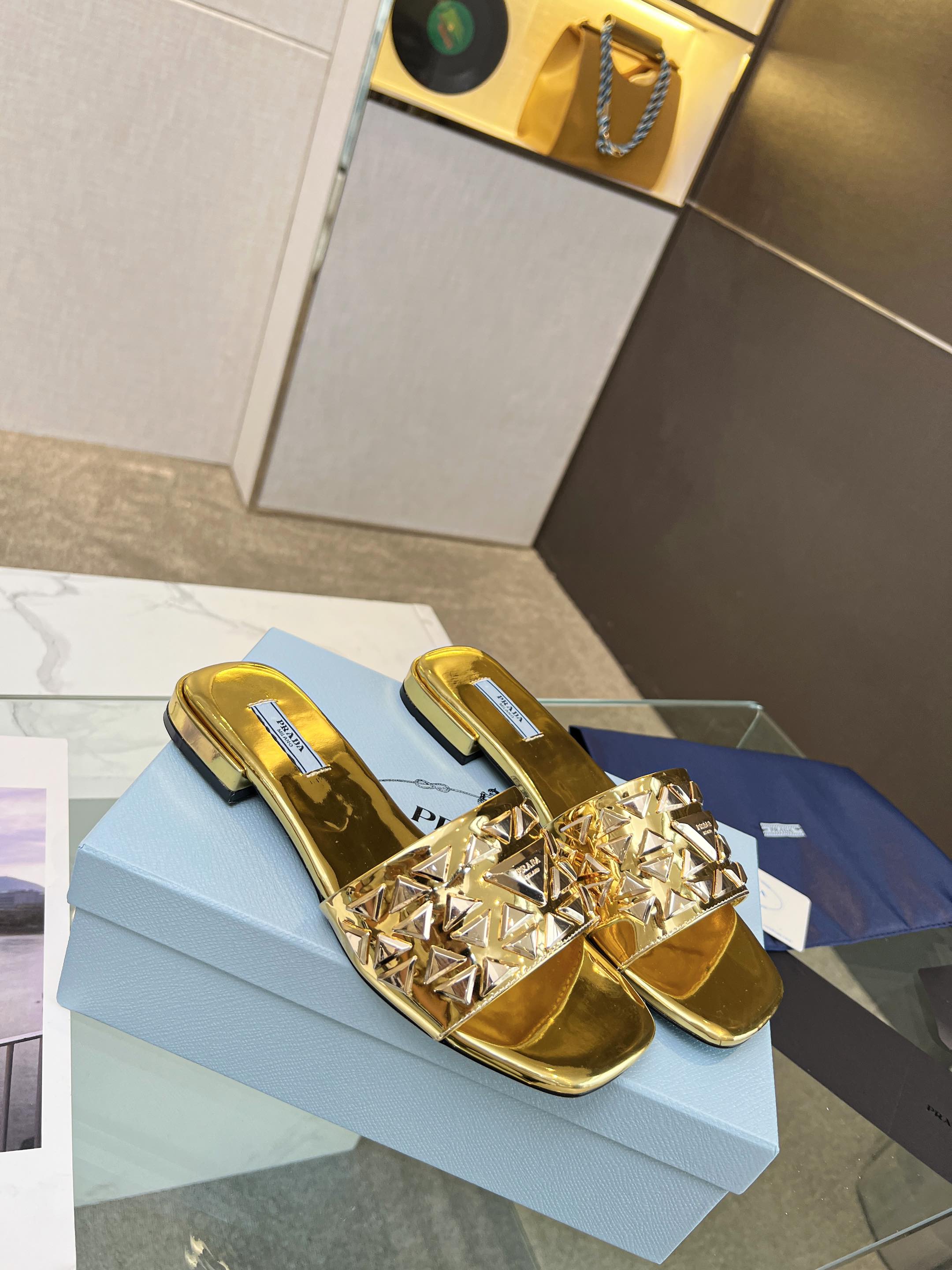 PRADA EMBROIDERED SLIDES FLAT METALLIC GOLD CALFSKIN