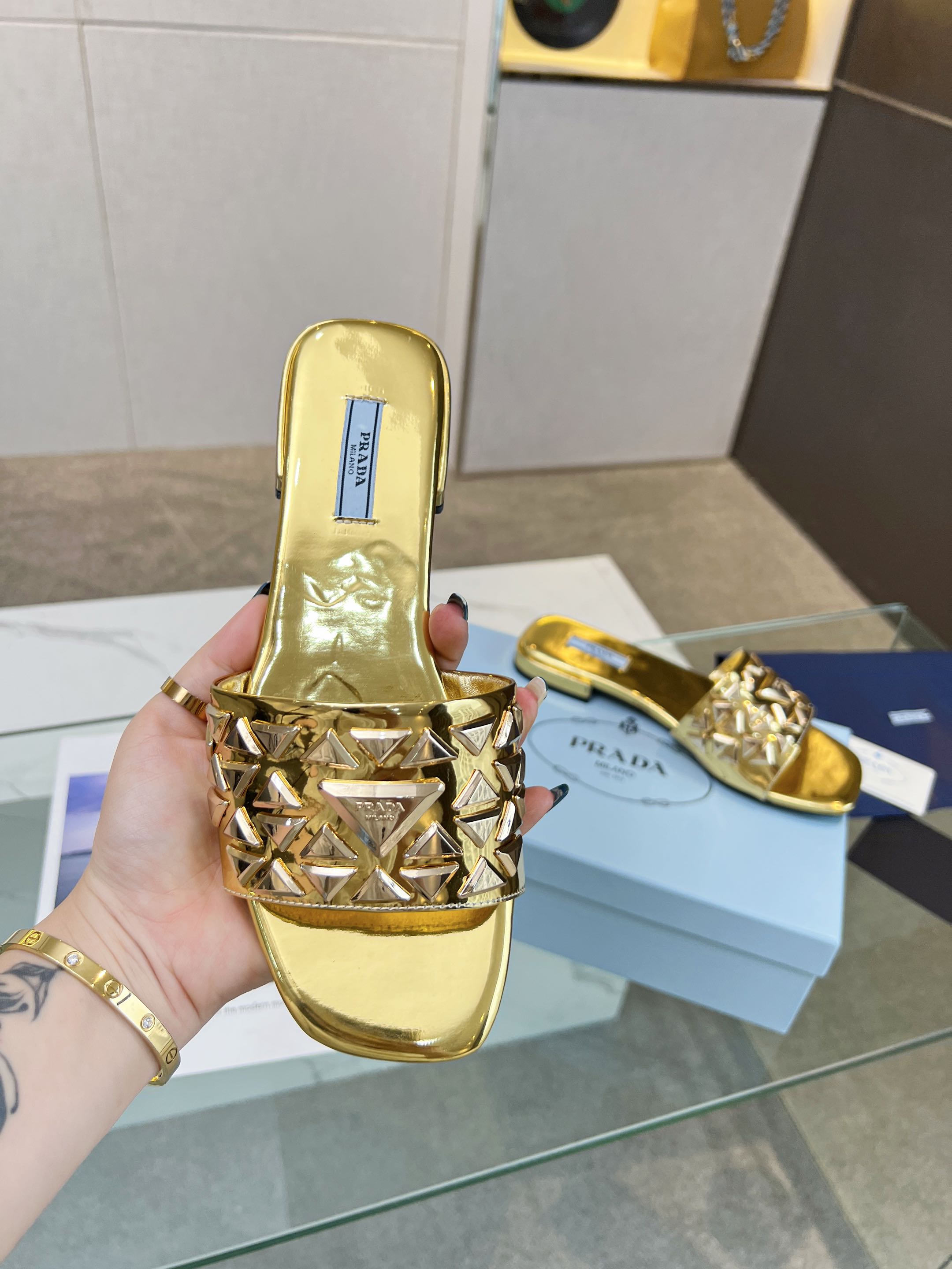 PRADA EMBROIDERED SLIDES FLAT METALLIC GOLD CALFSKIN