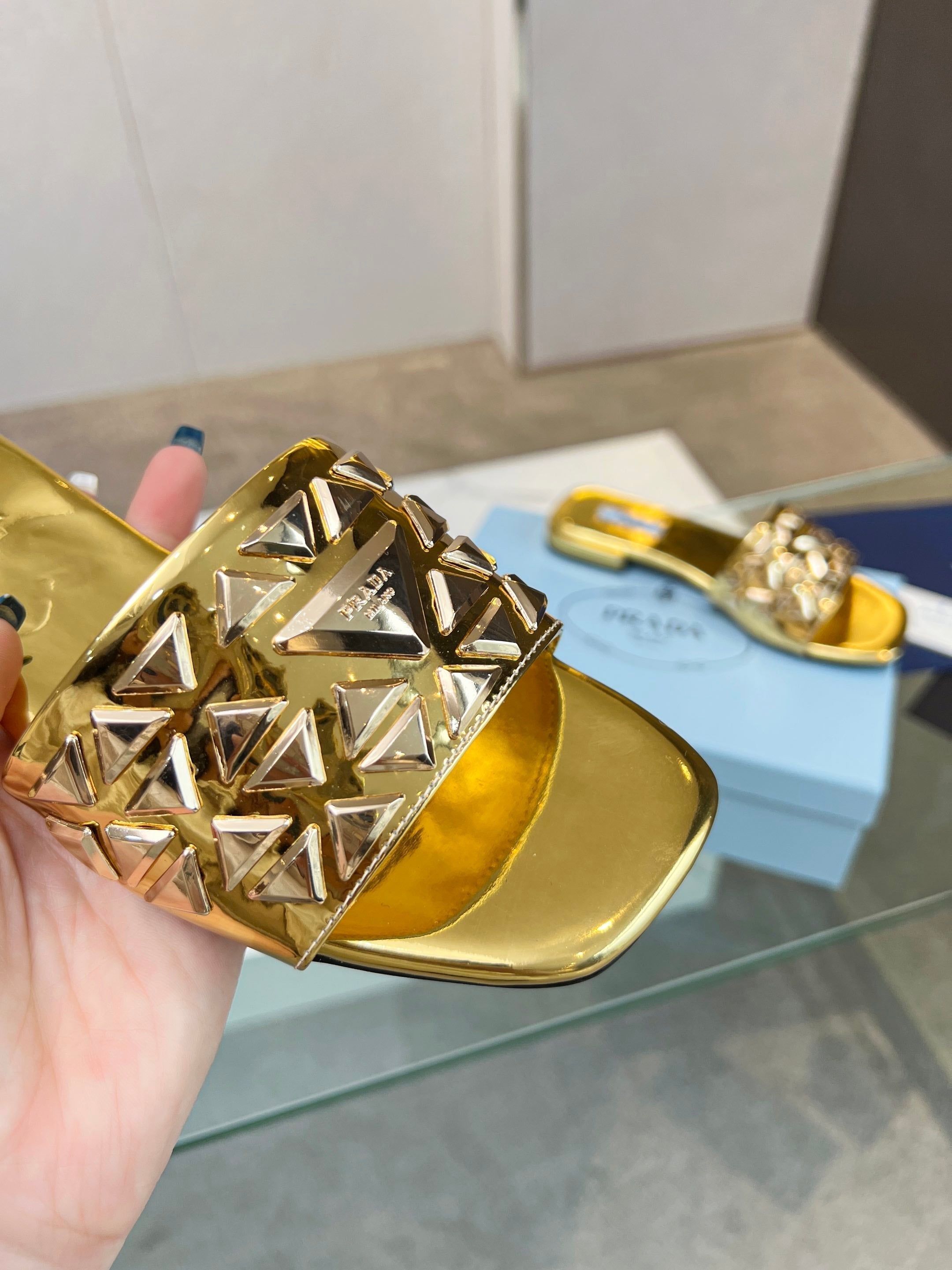 PRADA EMBROIDERED SLIDES FLAT METALLIC GOLD CALFSKIN