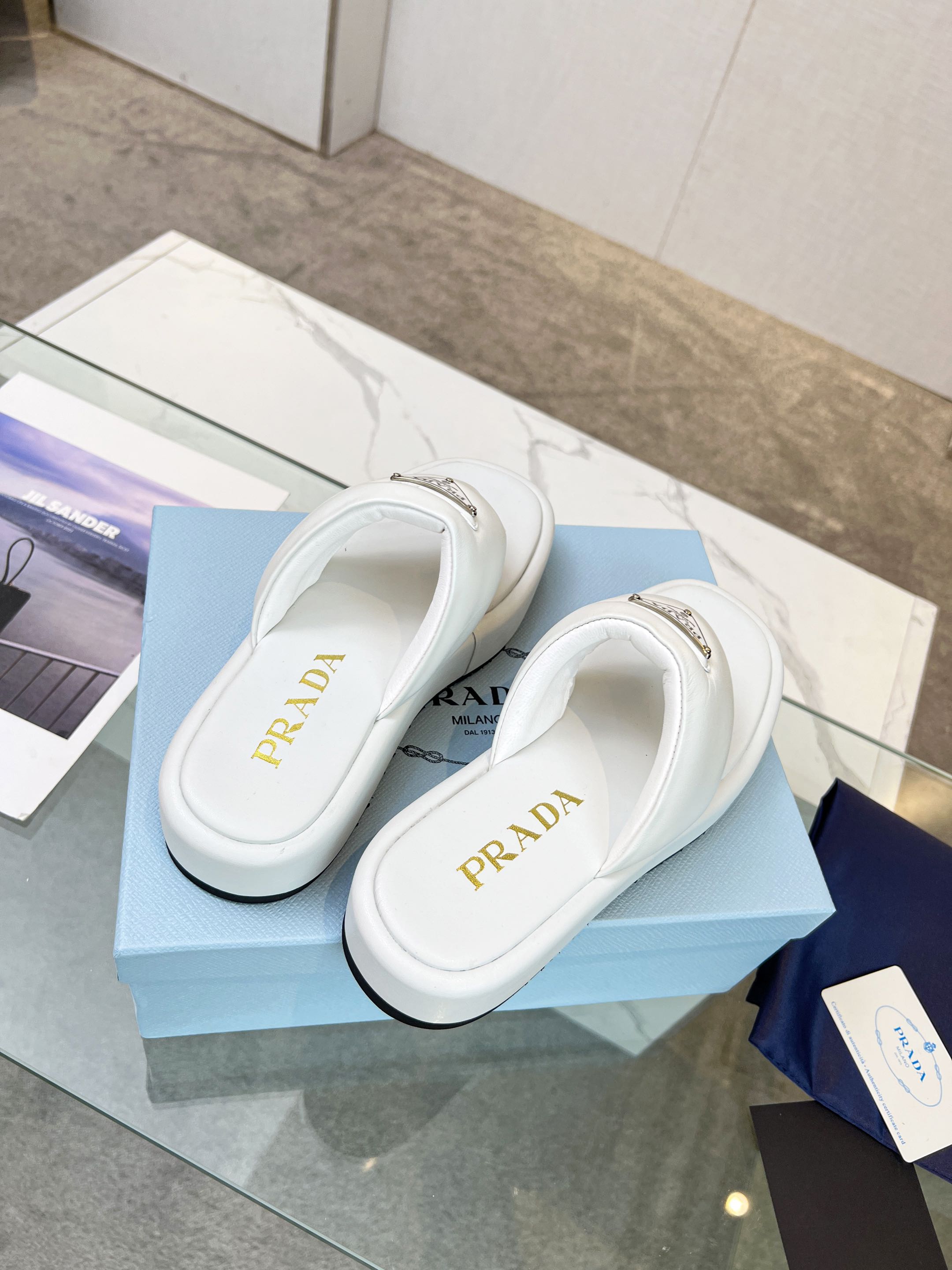 PRADA SOFT PADDED NAPPA THONG WEDGE SANLS WHITE LAMBSKIN