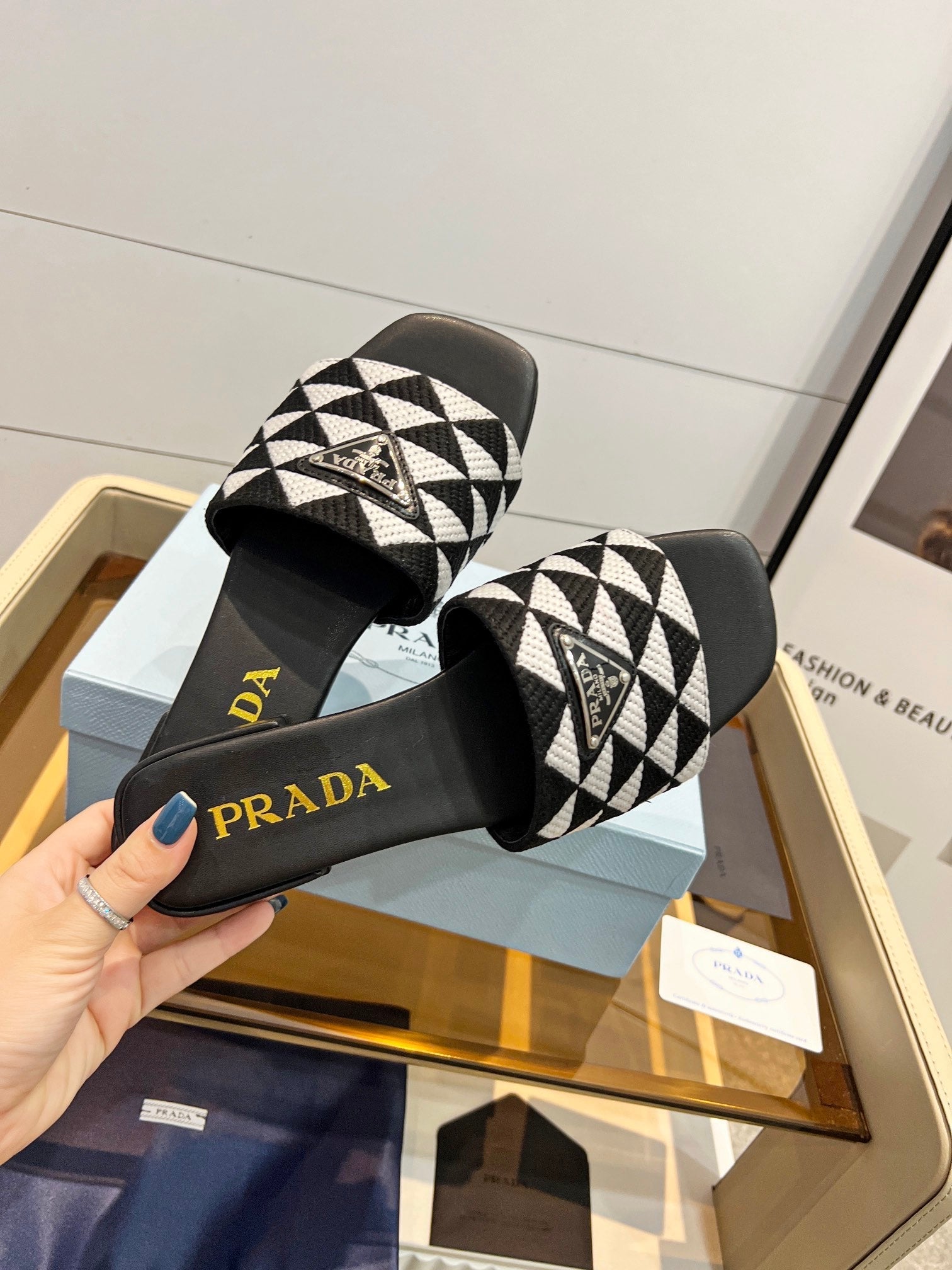 PRADA EMBROIDERED SLIDES FLAT BLACK AND WHITE FABRIC