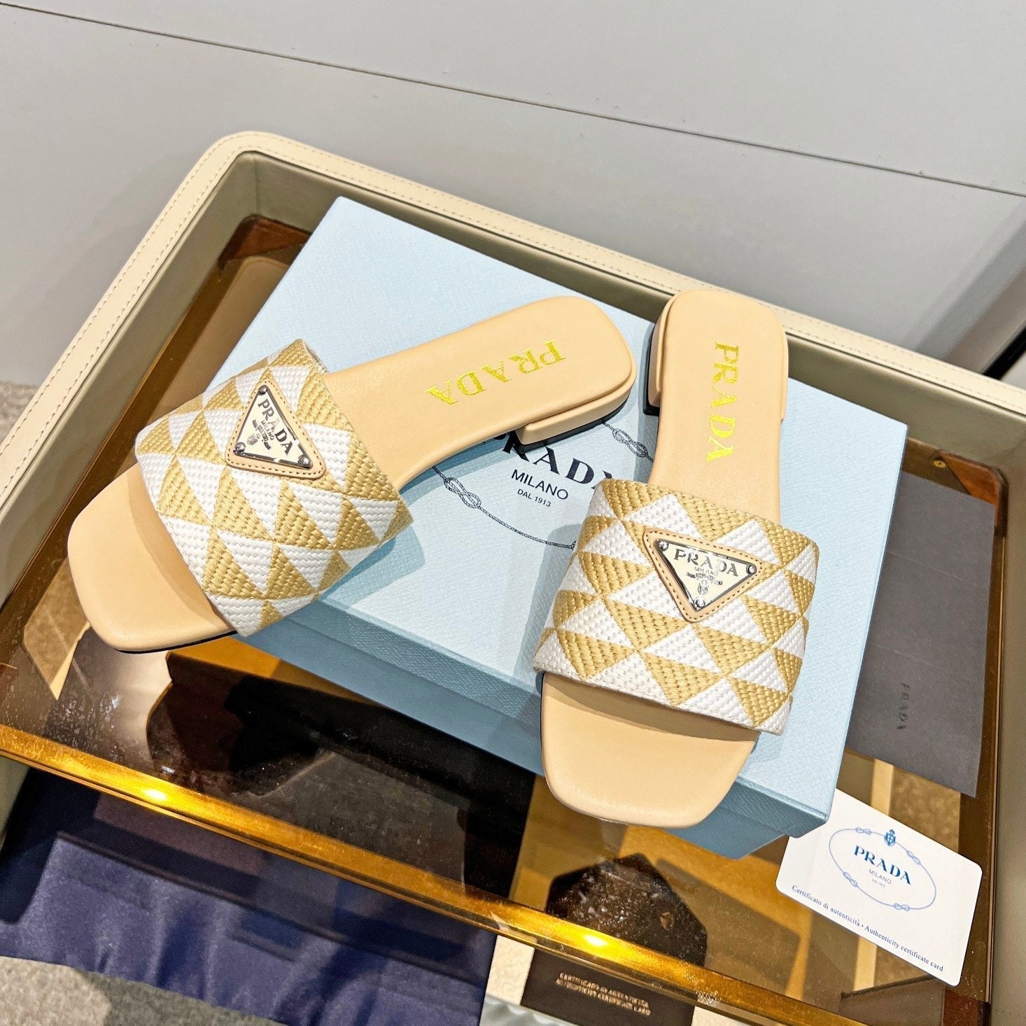 PRADA EMBROIDERED SLIDES FLAT BEIGE FABRIC