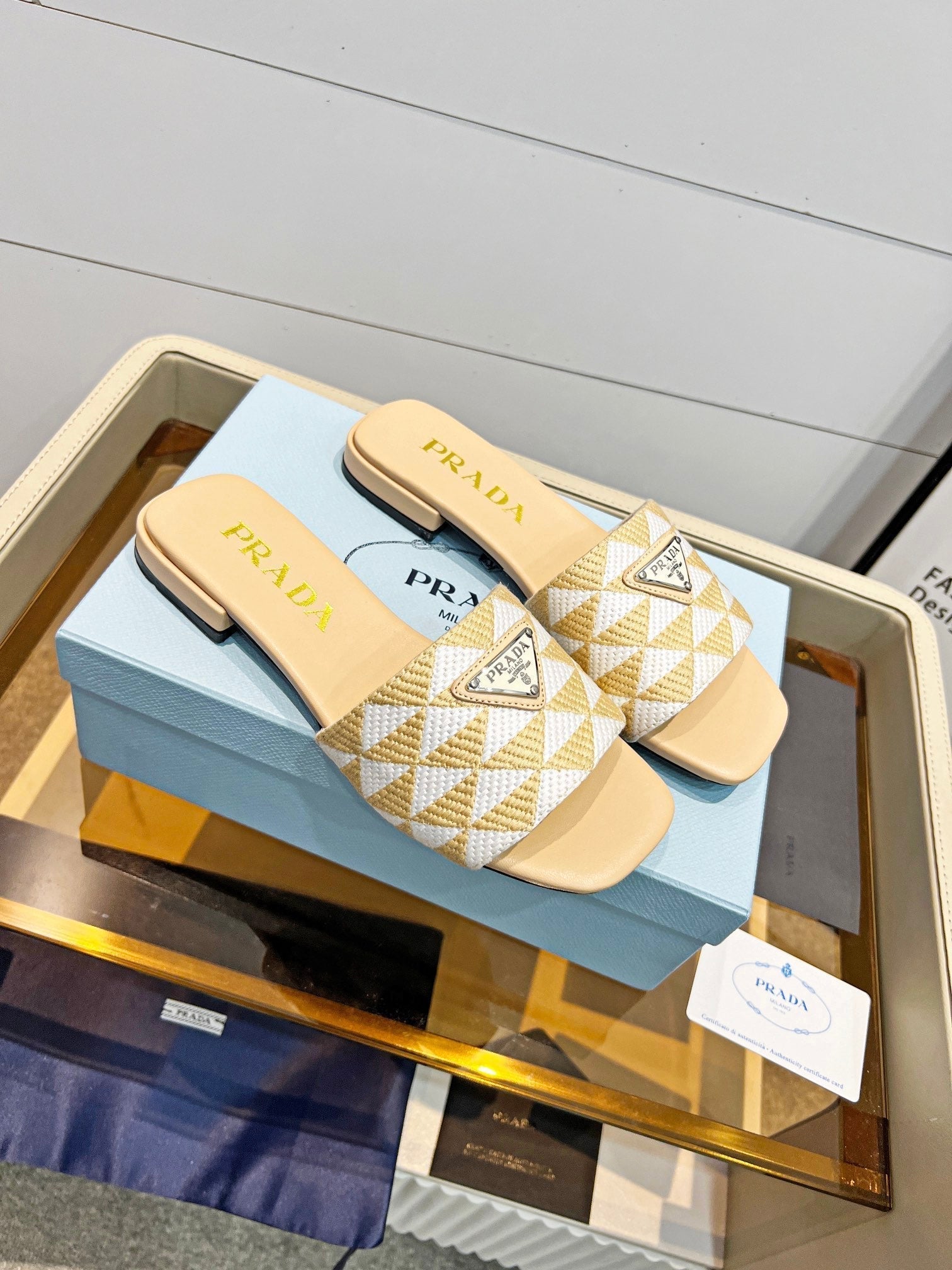 PRADA EMBROIDERED SLIDES FLAT BEIGE FABRIC