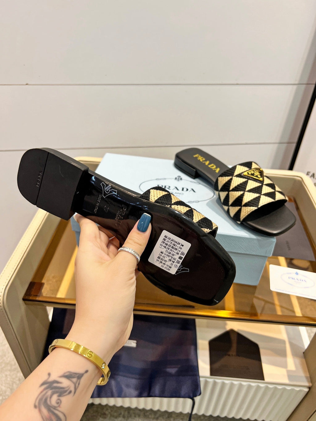 PRADA EMBROIDERED SLIDES FLAT BLACK AND BEIGE FABRIC
