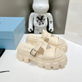 PRADA MONOLITH SLIPPER SANLS IN BEIGE RUBBER