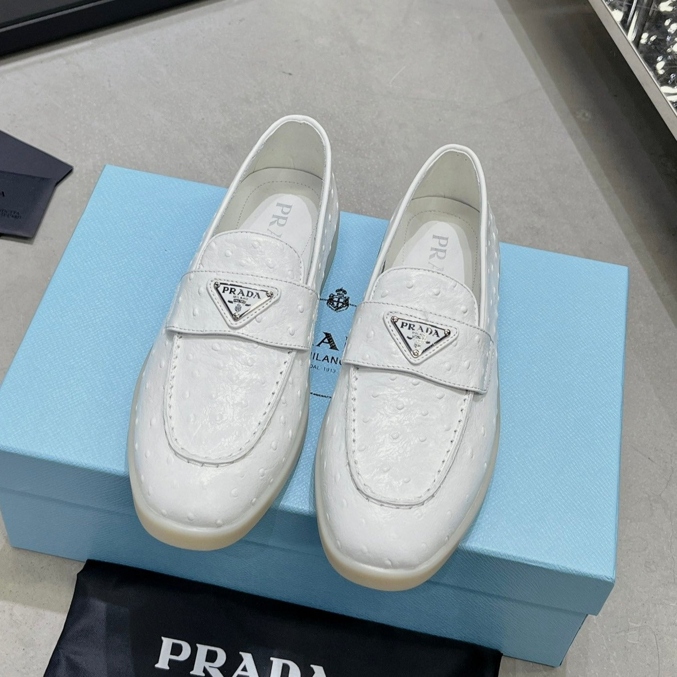 PRADA OSTRICH PATTERN LOAFERS WHITE CALFSKIN