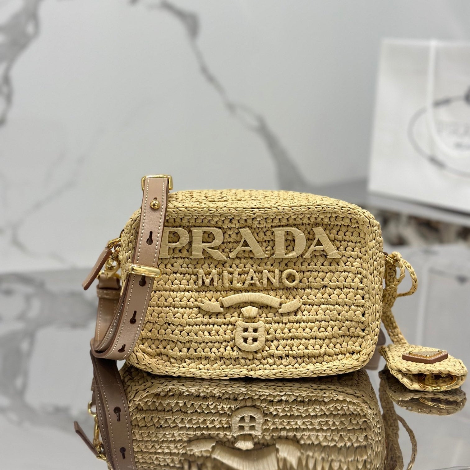 PRADA CAMERA BAG 20 IN BEIGE WOVEN RAFFIA