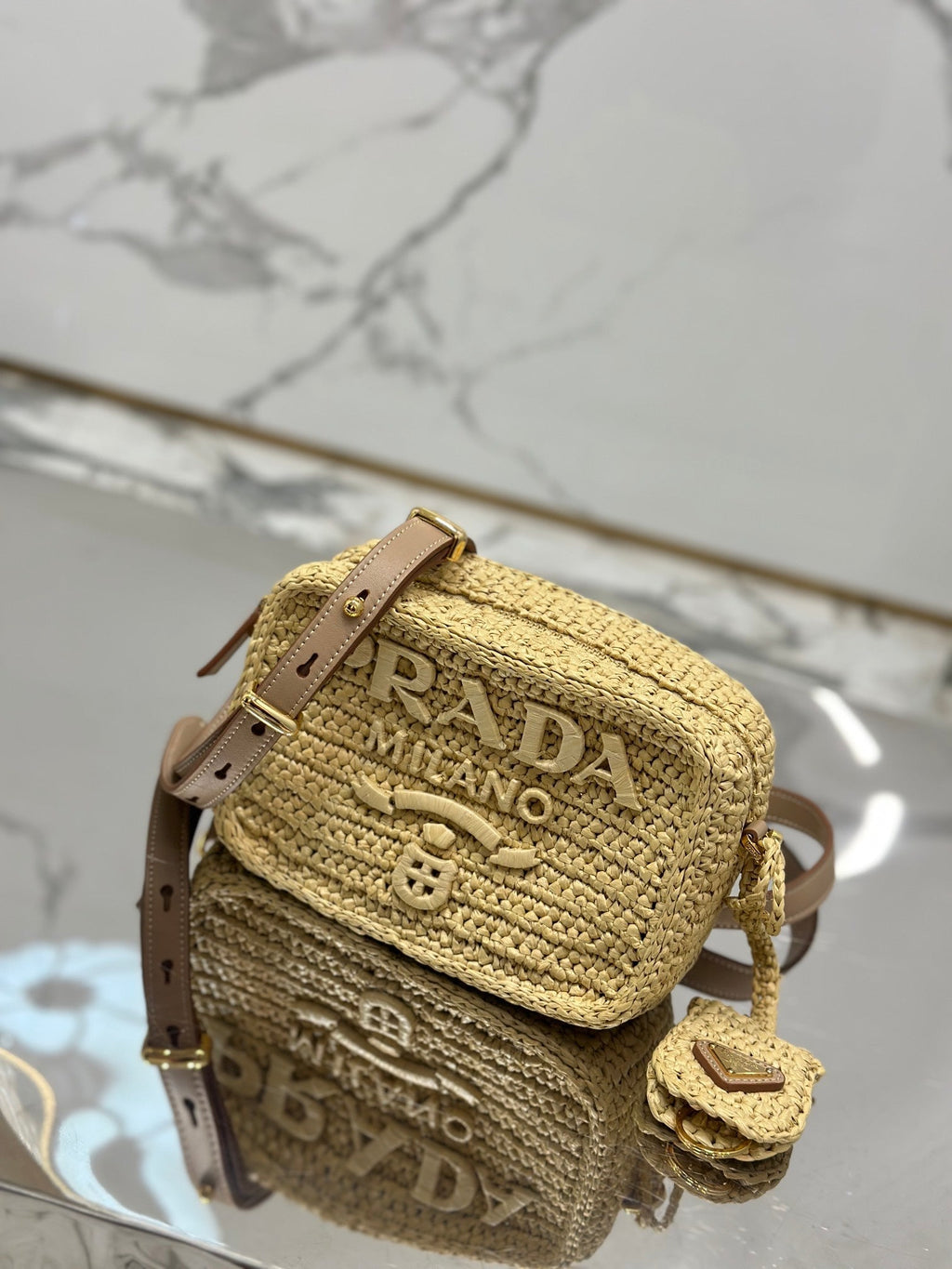 PRADA CAMERA BAG 20 IN BEIGE WOVEN RAFFIA