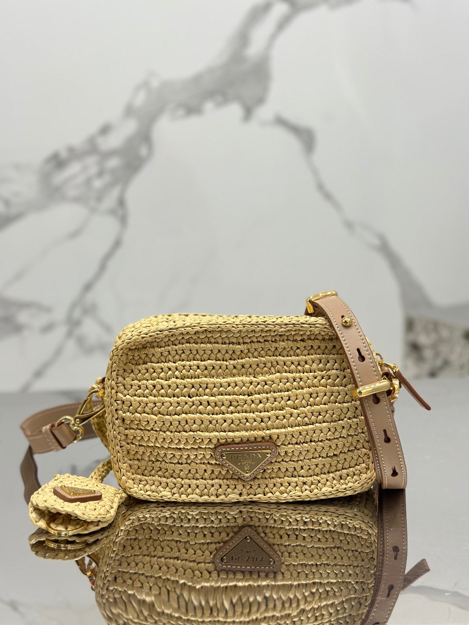 PRADA CAMERA BAG 20 IN BEIGE WOVEN RAFFIA