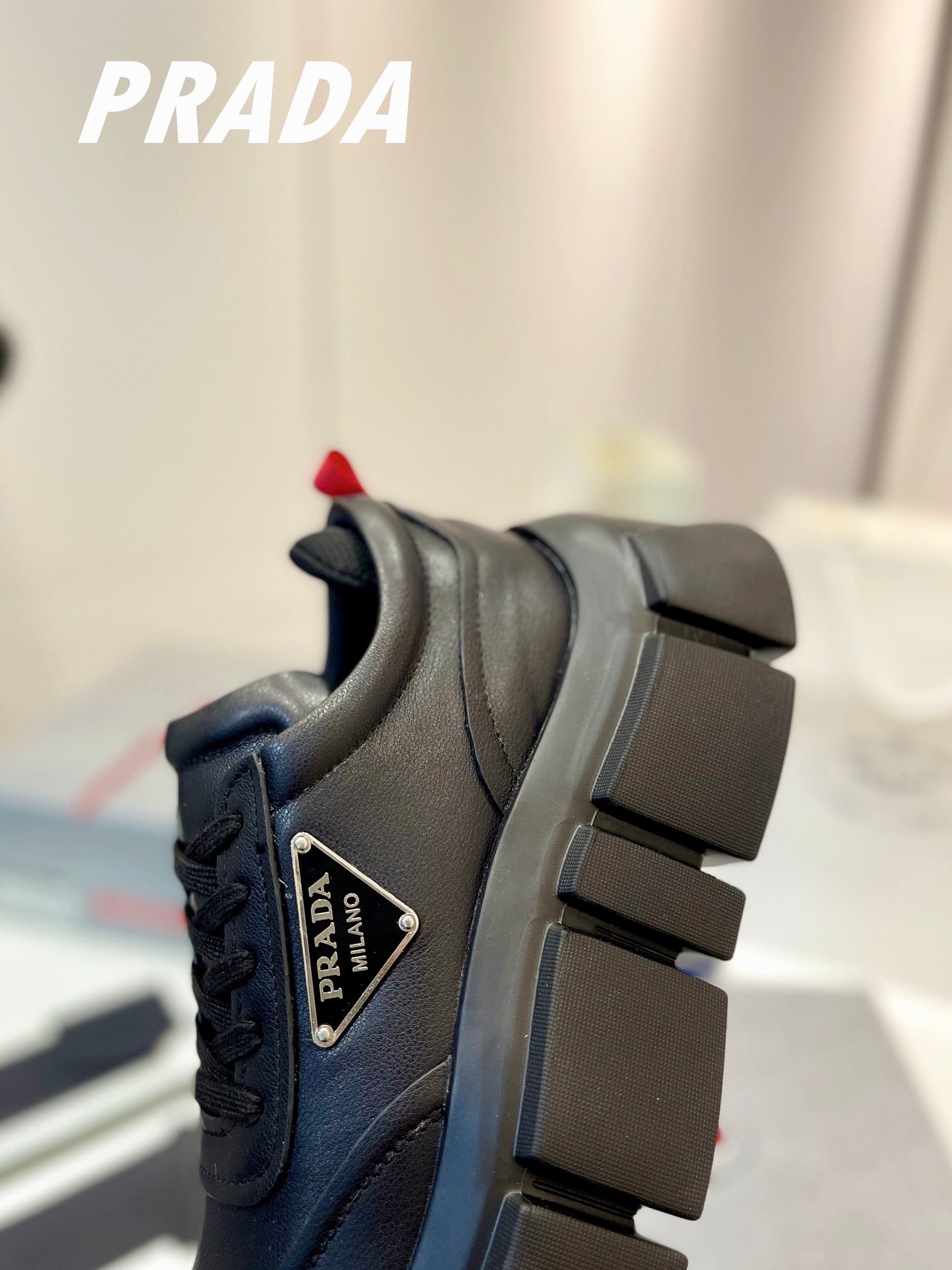 PRADA BRUSHED THICK-SOLE SNEAKERS BLACK CALFSKIN