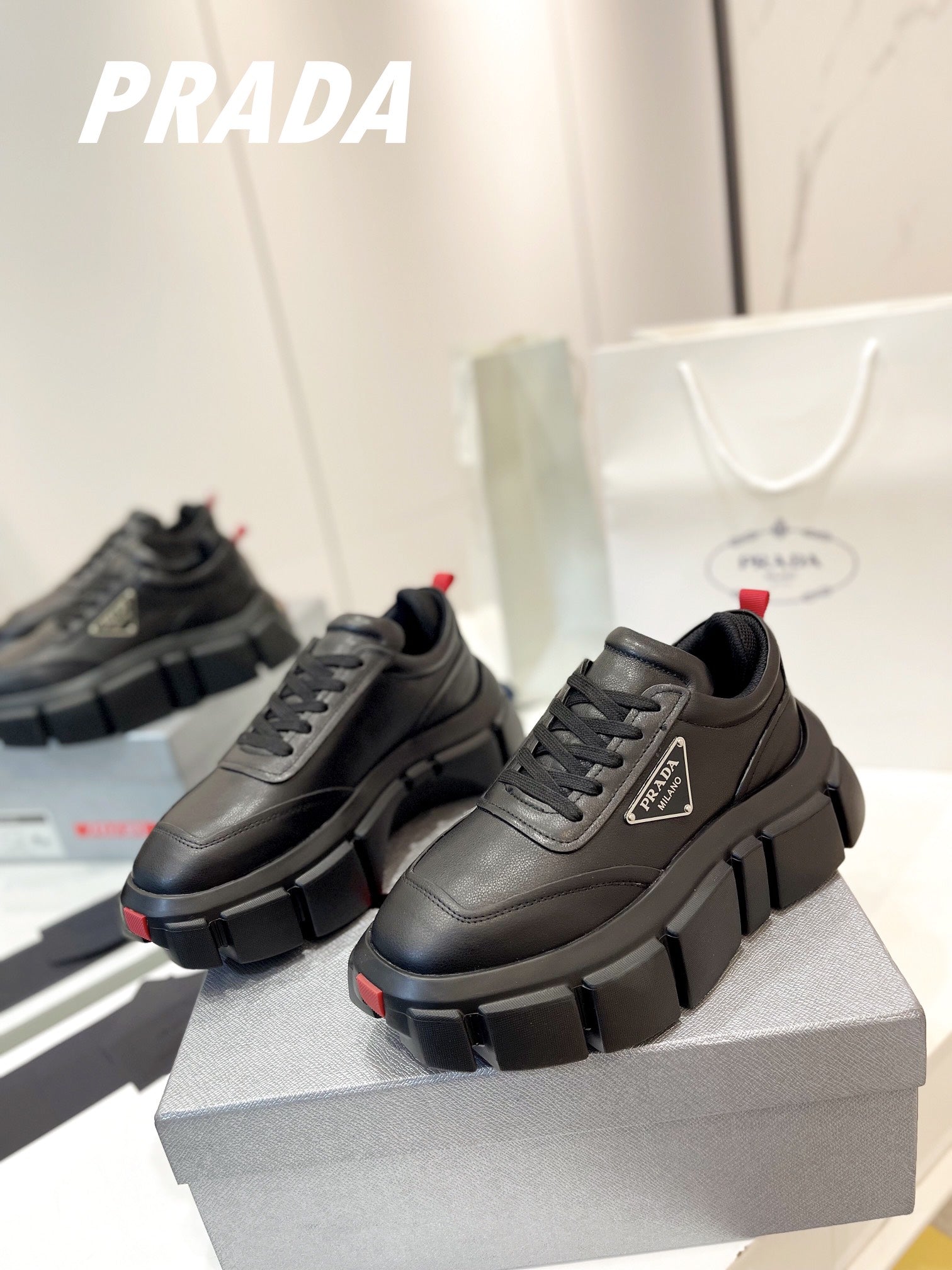 PRADA BRUSHED THICK-SOLE SNEAKERS BLACK CALFSKIN