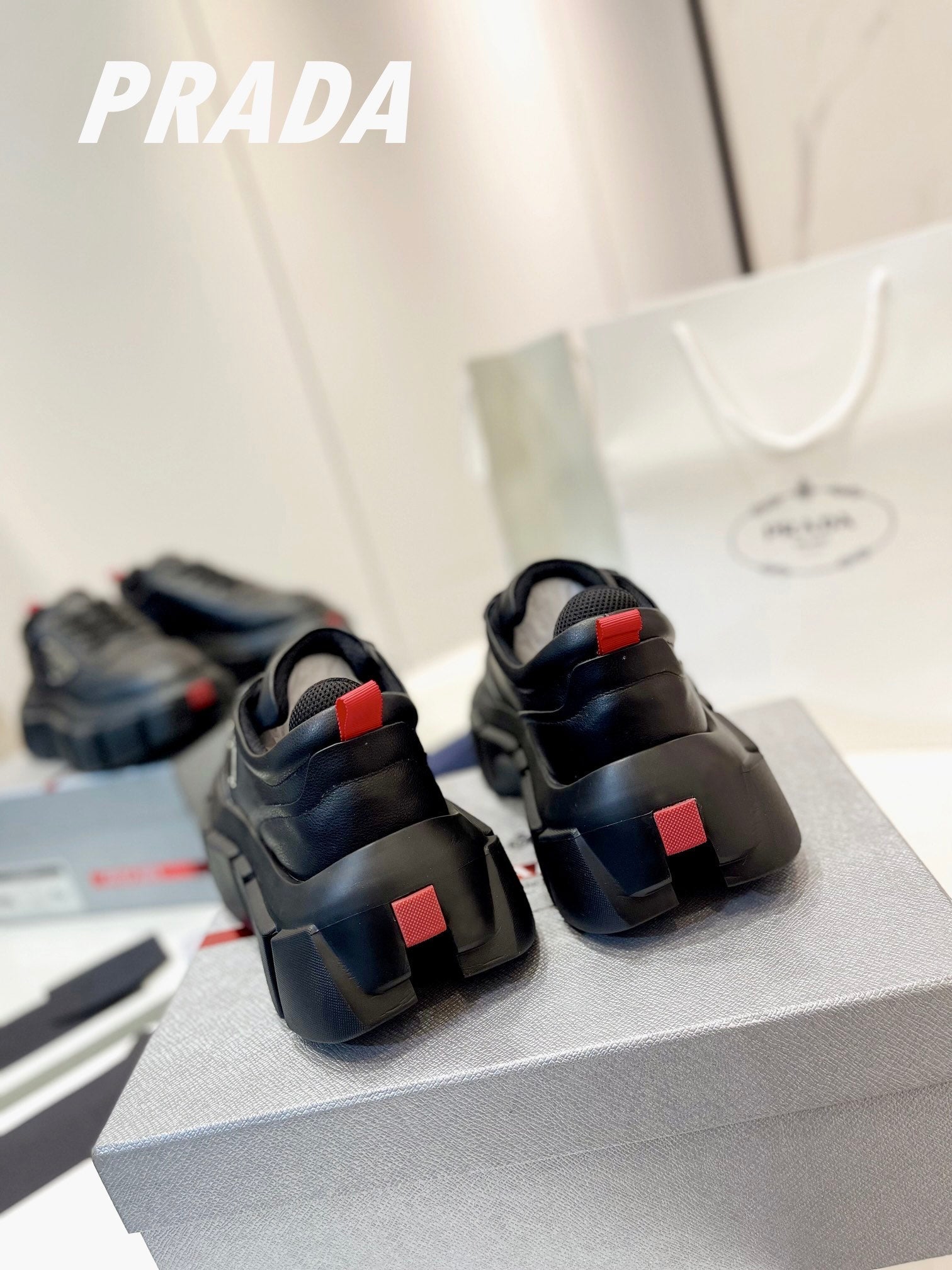 PRADA BRUSHED THICK-SOLE SNEAKERS BLACK CALFSKIN