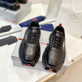 PRADA BRUSHED THICK-SOLE SNEAKERS BLACK CALFSKIN