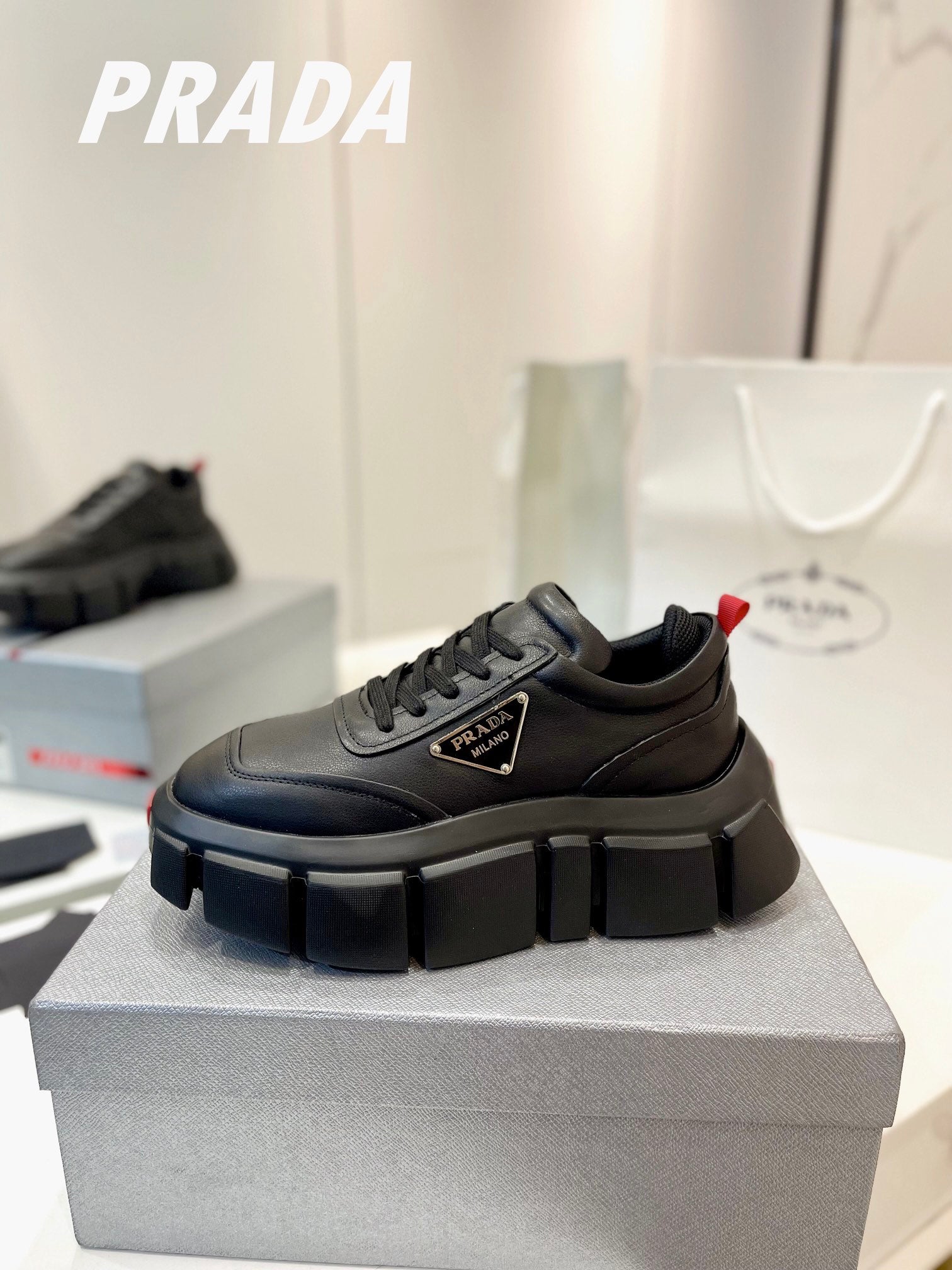 PRADA BRUSHED THICK-SOLE SNEAKERS BLACK CALFSKIN