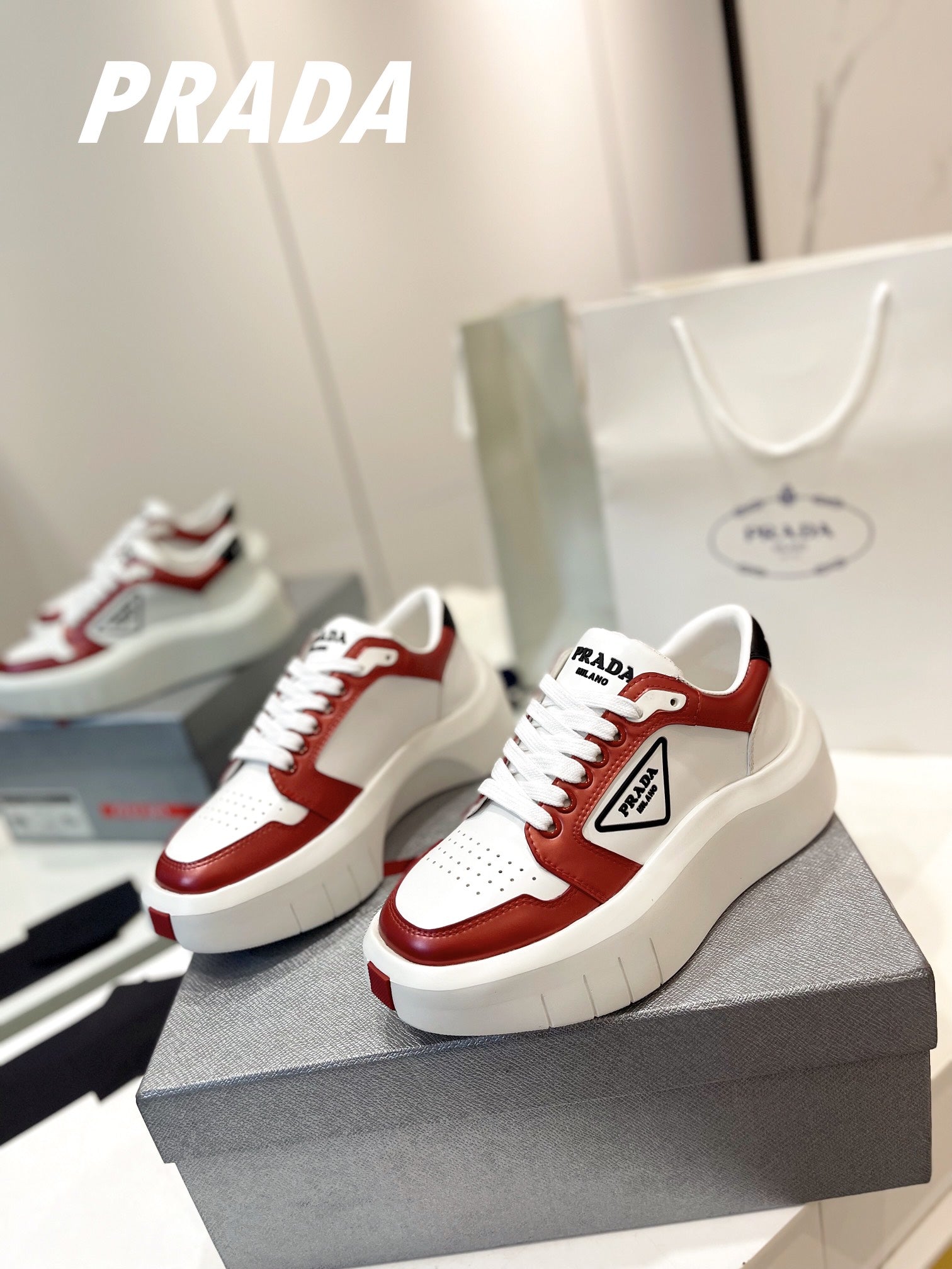PRADA DOWNTOWN THICK-SOLE SNEAKERS WHITE AND CHERRY CALFSKIN