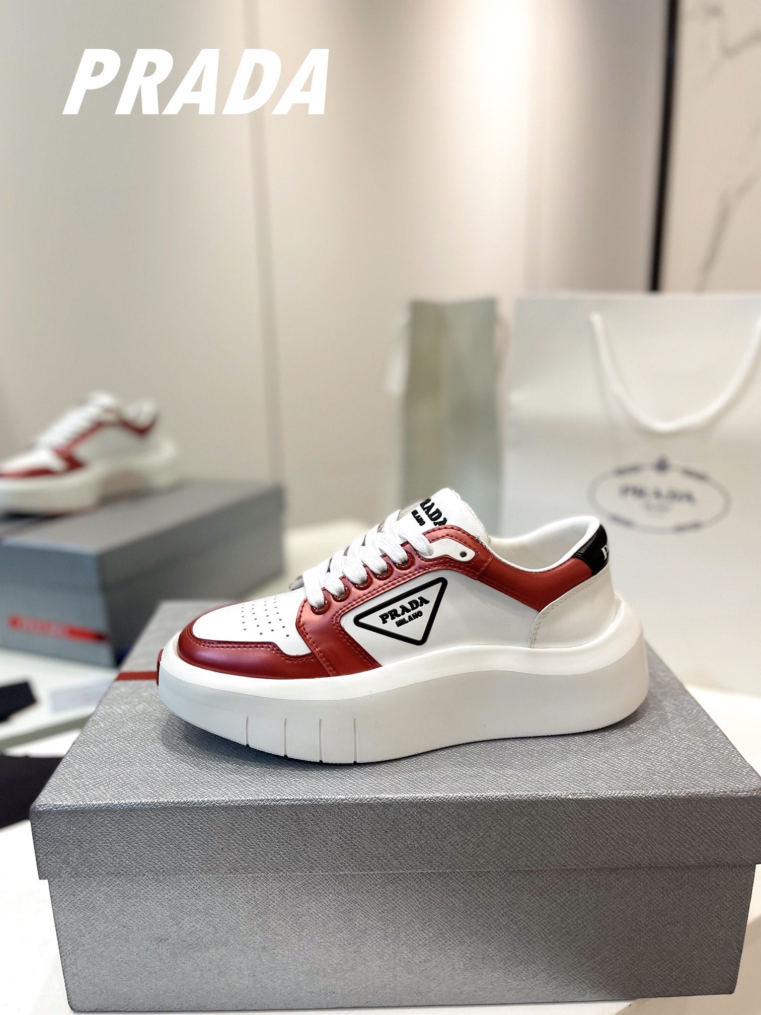 PRADA DOWNTOWN THICK-SOLE SNEAKERS WHITE AND CHERRY CALFSKIN