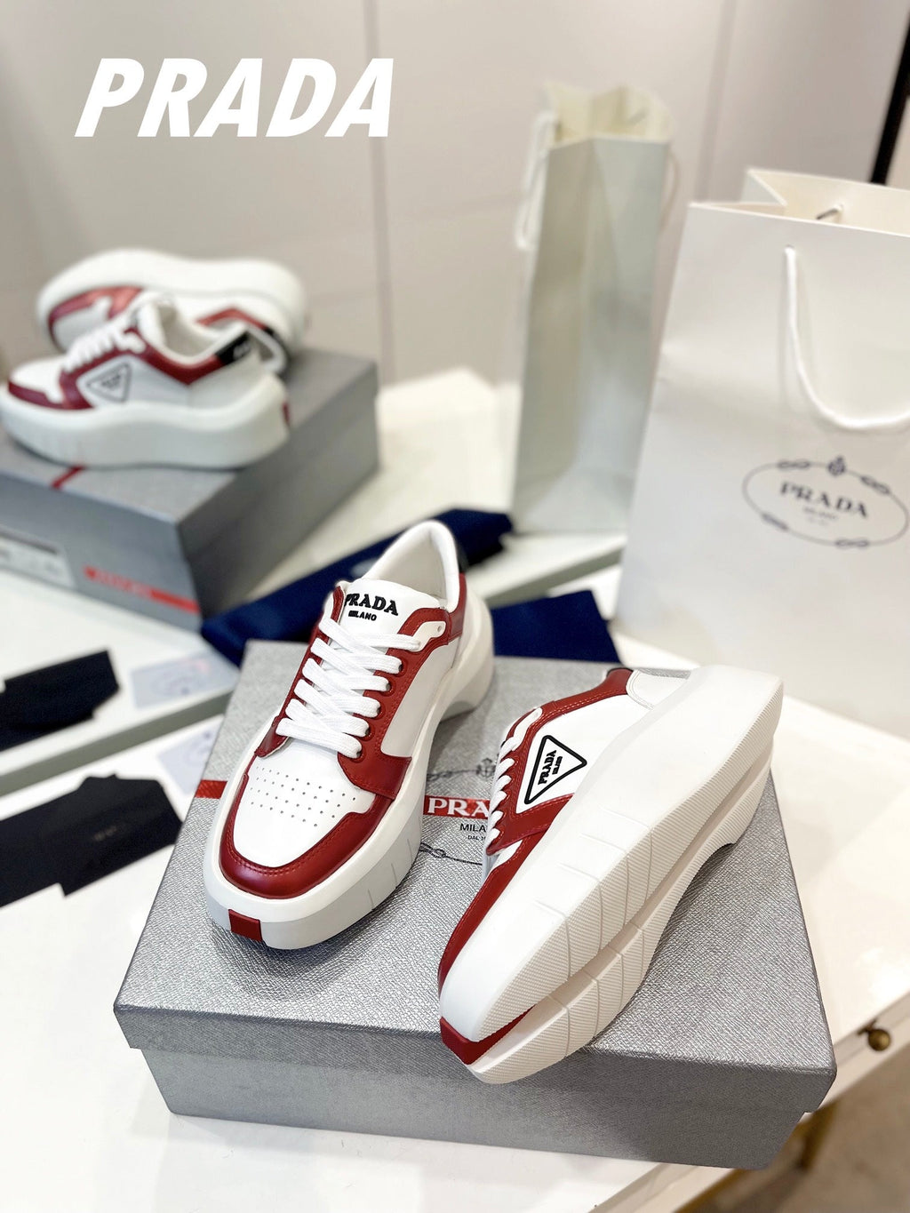 PRADA DOWNTOWN THICK-SOLE SNEAKERS WHITE AND CHERRY CALFSKIN