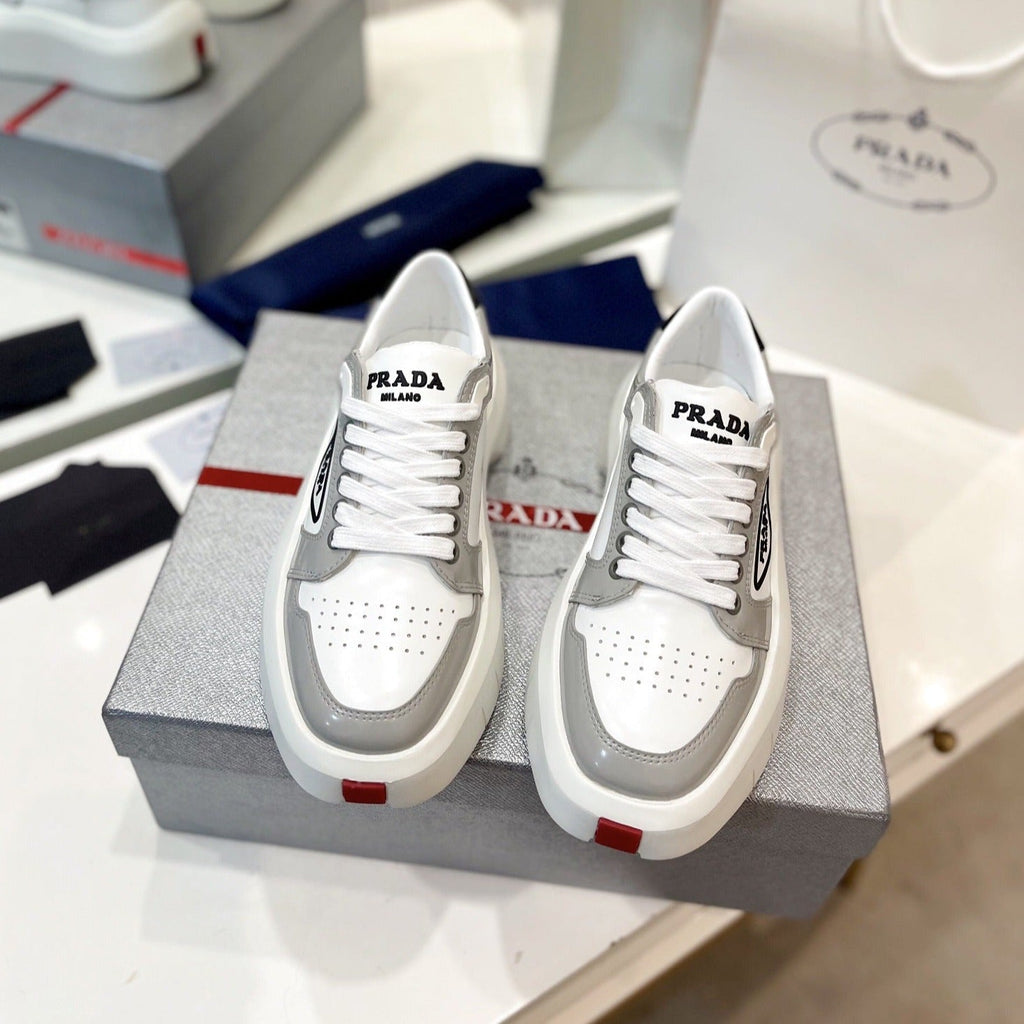 PRADA DOWNTOWN THICK-SOLE SNEAKERS WHITE AND GRAY CALFSKIN