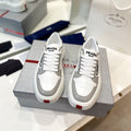 PRADA DOWNTOWN THICK-SOLE SNEAKERS WHITE AND GRAY CALFSKIN