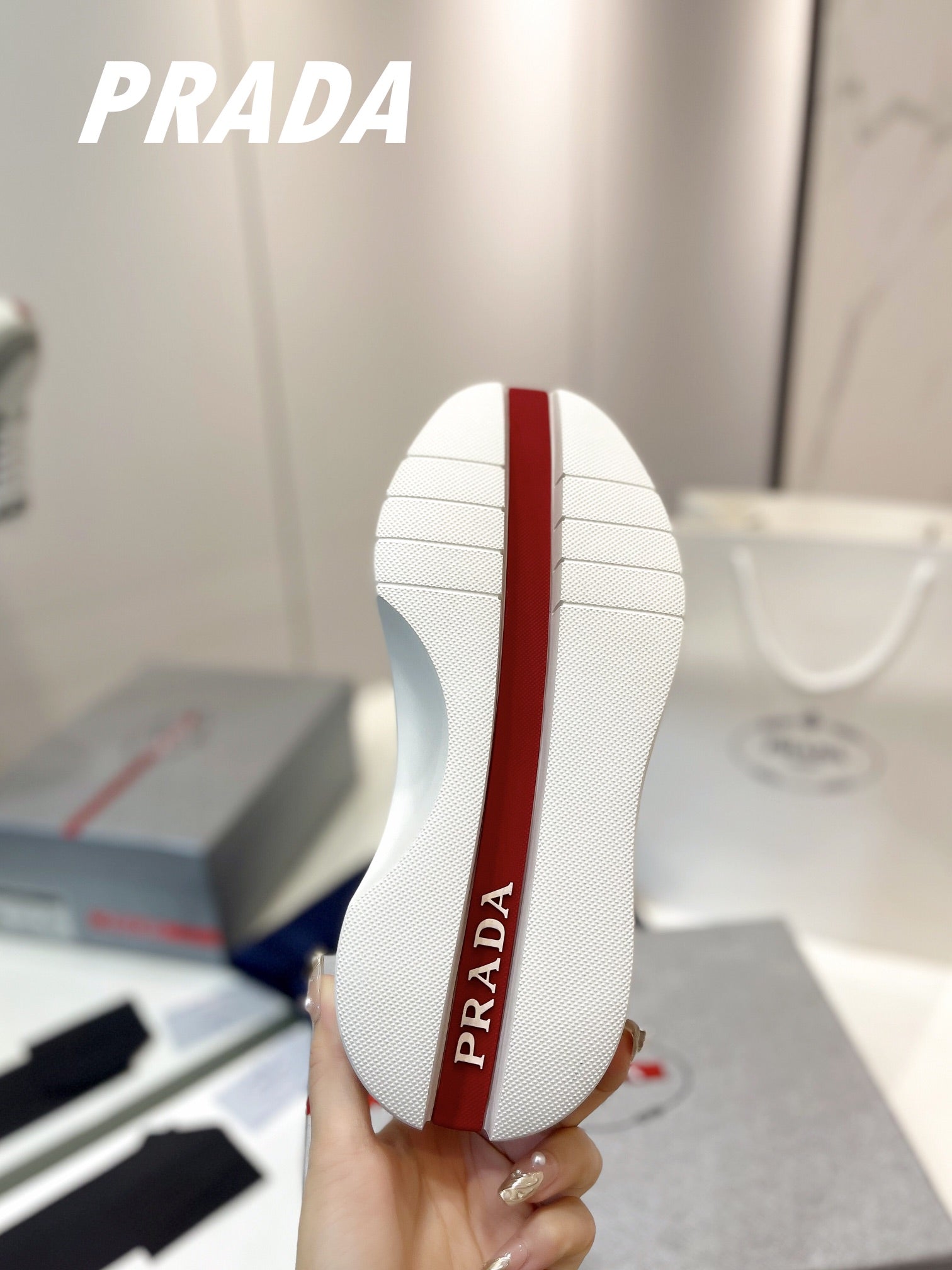 PRADA DOWNTOWN THICK-SOLE SNEAKERS WHITE AND GRAY CALFSKIN