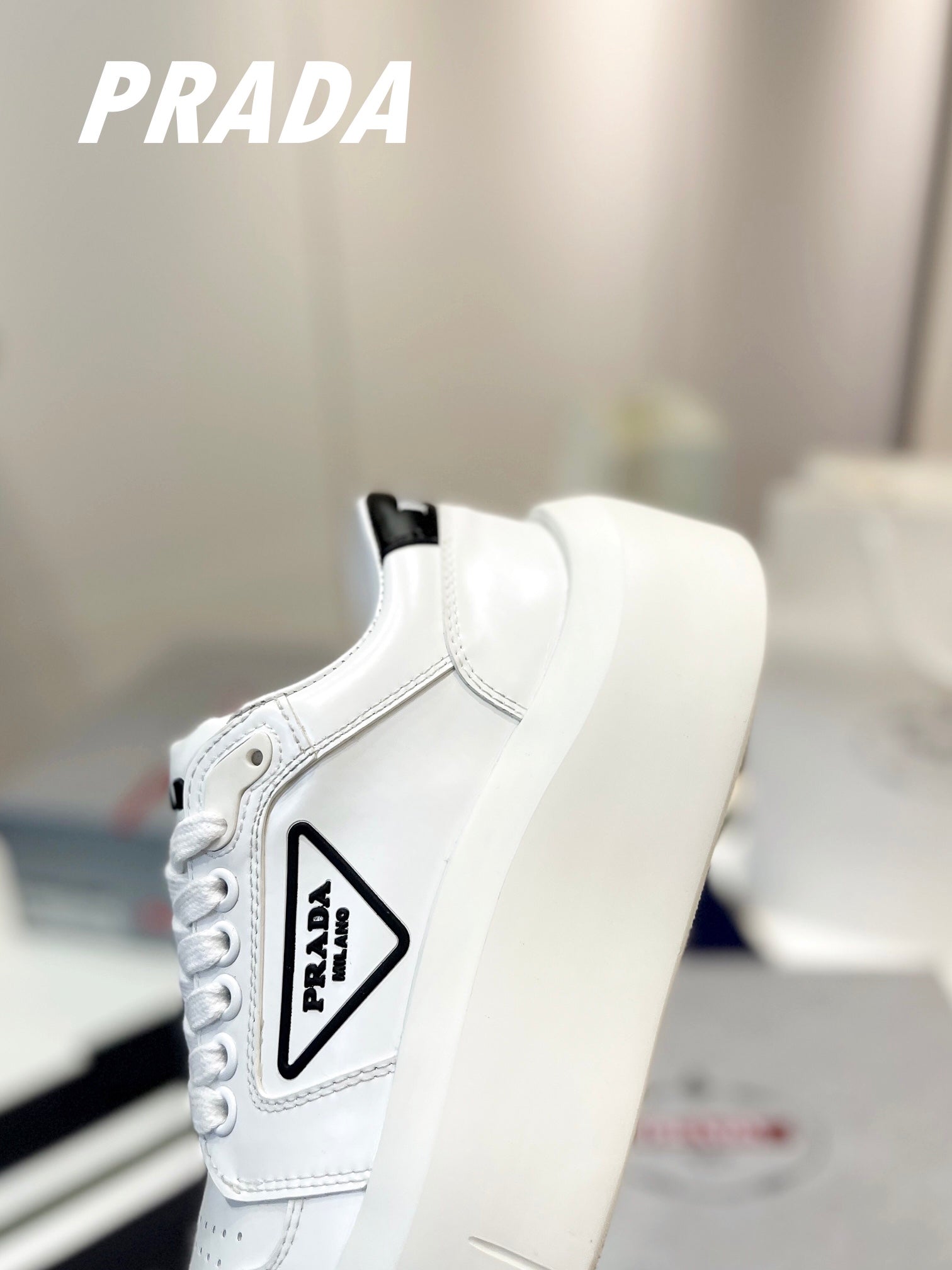 PRADA DOWNTOWN THICK-SOLE SNEAKERS WHITE CALFSKIN