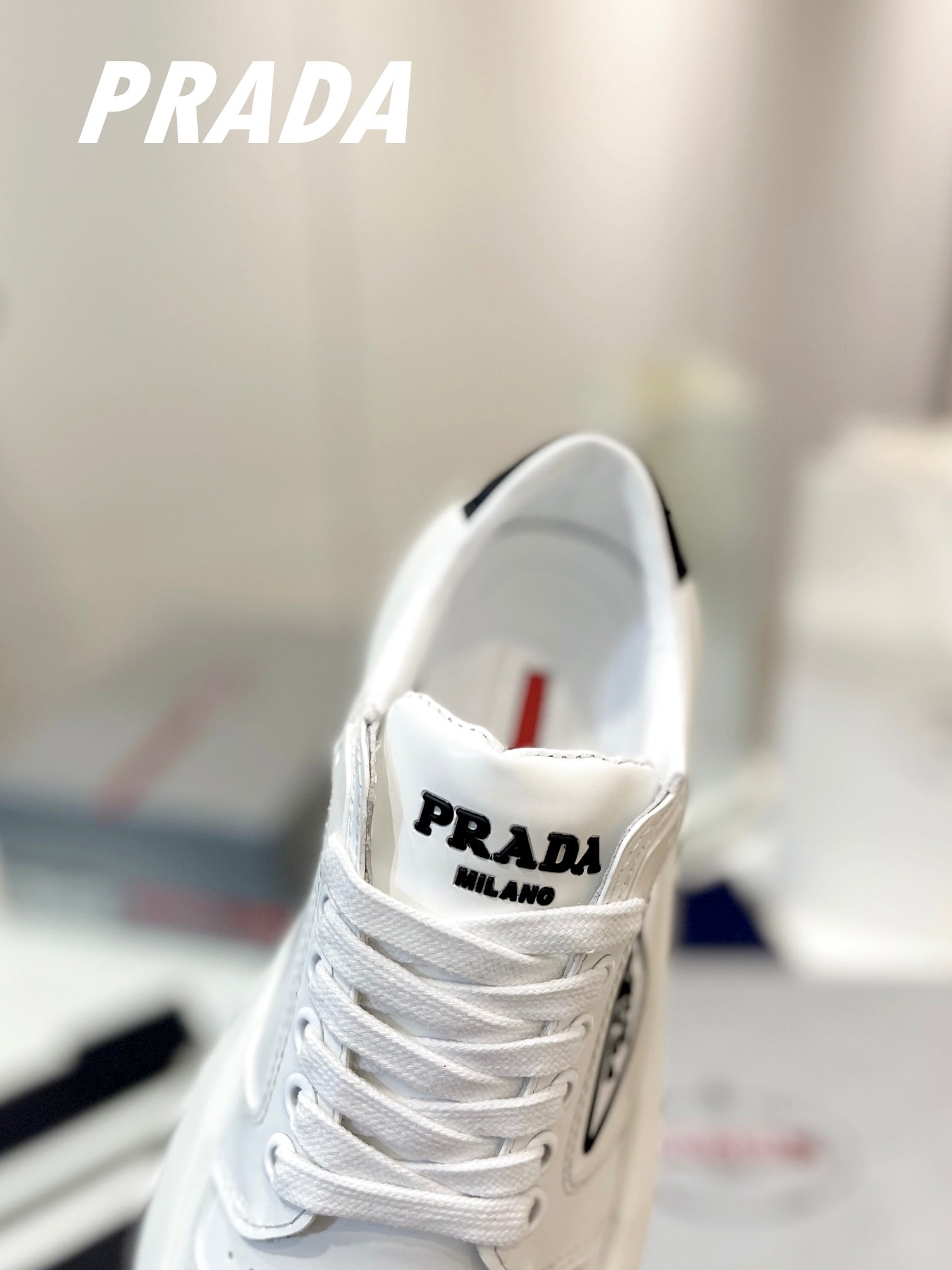 PRADA DOWNTOWN THICK-SOLE SNEAKERS WHITE CALFSKIN