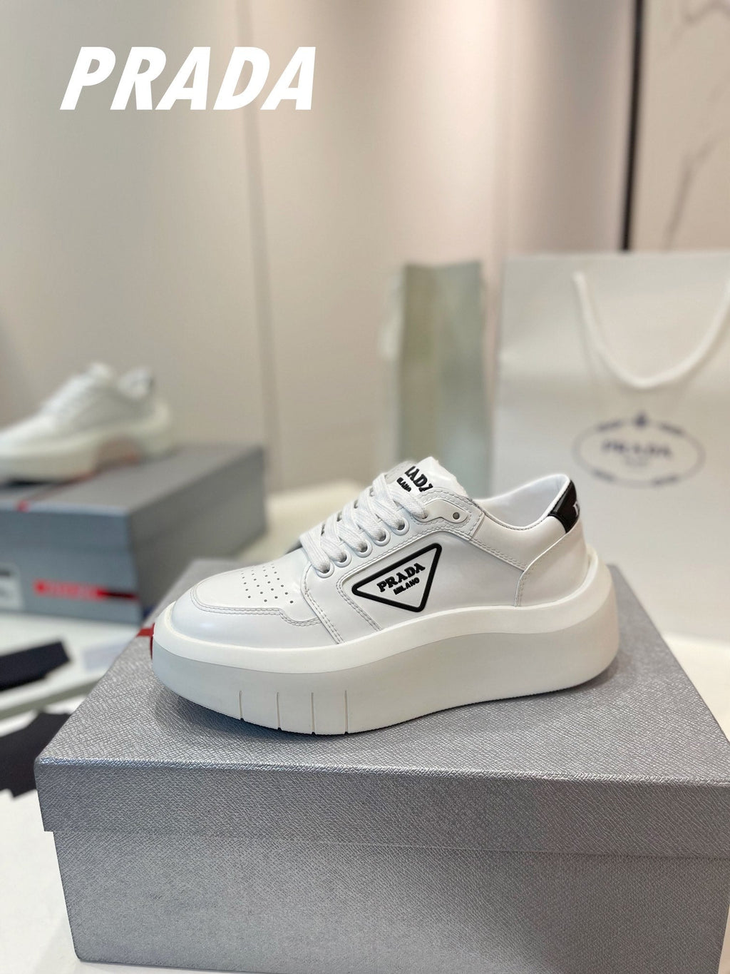 PRADA DOWNTOWN THICK-SOLE SNEAKERS WHITE CALFSKIN