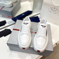 PRADA DOWNTOWN THICK-SOLE SNEAKERS WHITE CALFSKIN