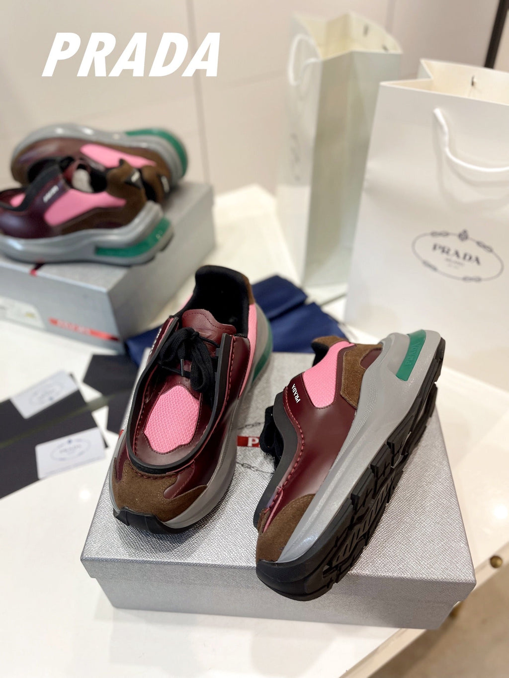 PRADA SYSTEME BRUSHED SNEAKERS WINE AND PINK CALFSKIN