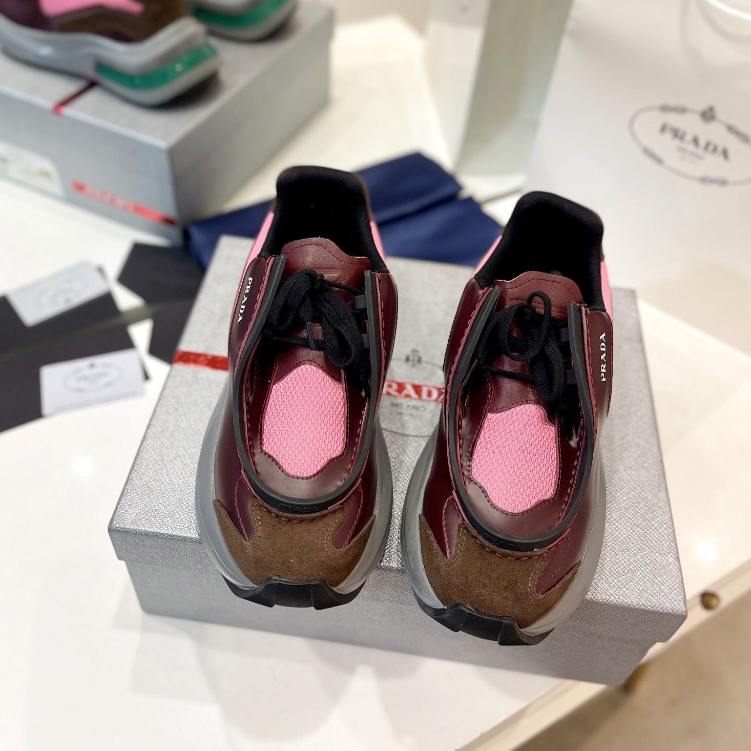 PRADA SYSTEME BRUSHED SNEAKERS WINE AND PINK CALFSKIN