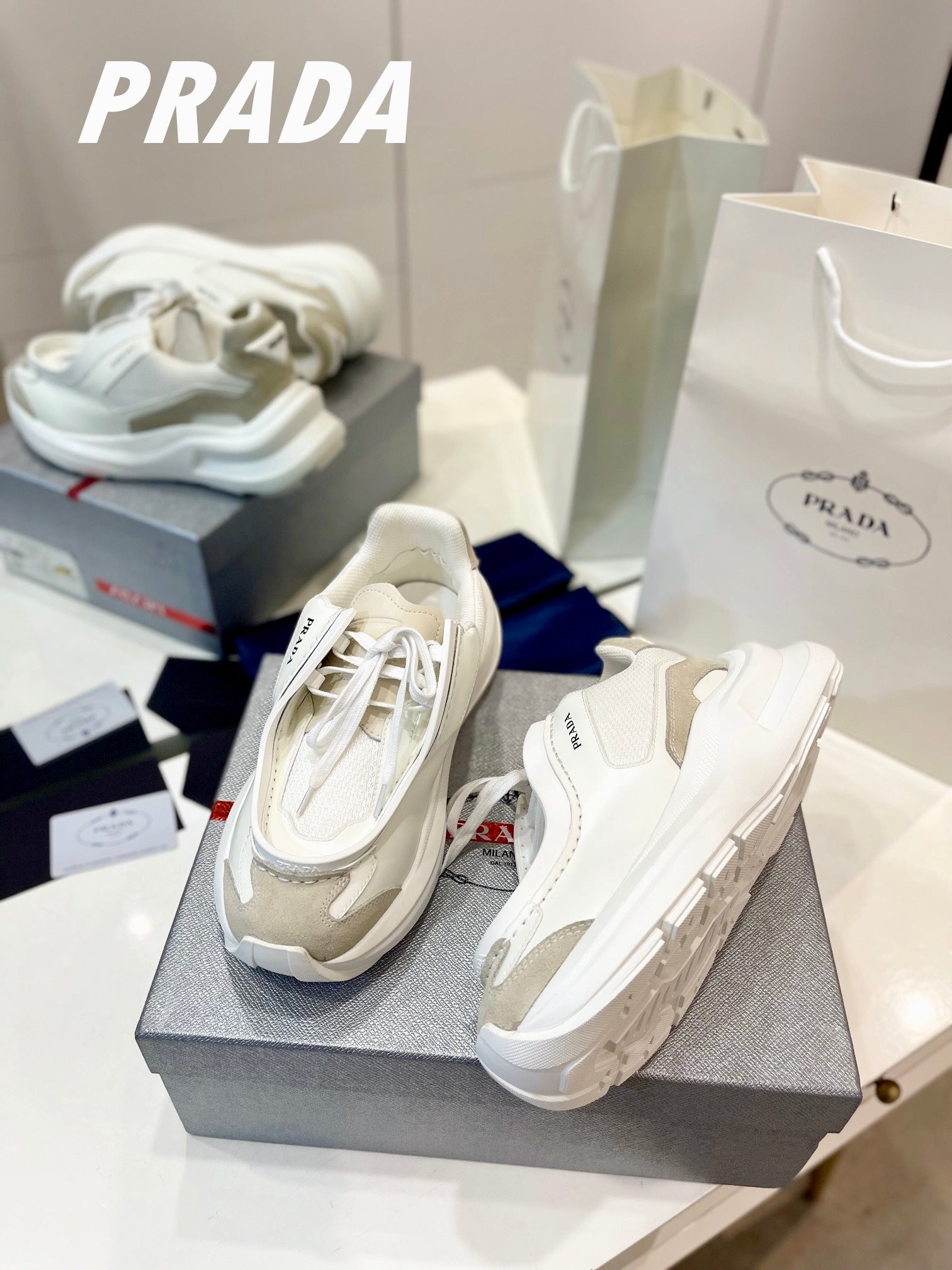 PRADA SYSTEME BRUSHED SNEAKERS WHITE CALFSKIN
