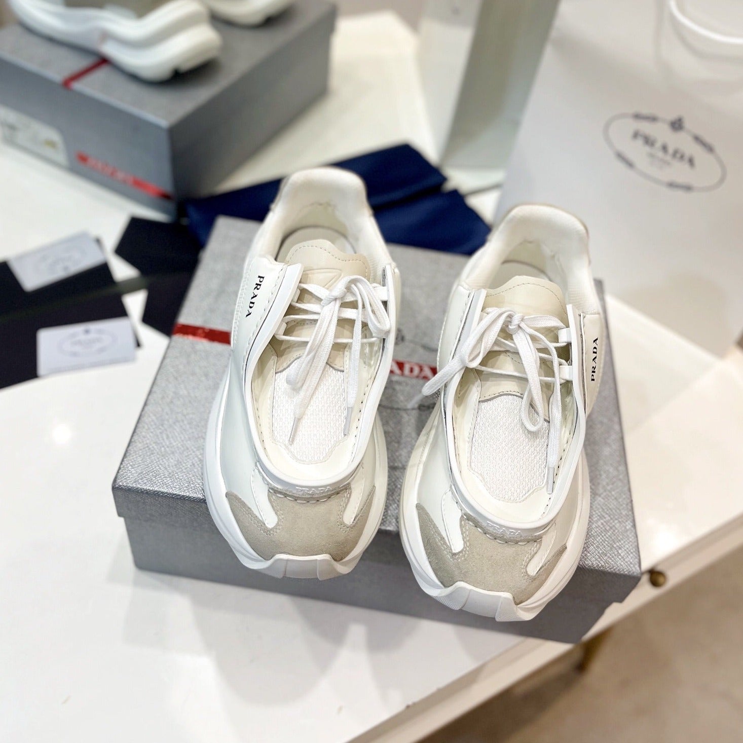 PRADA SYSTEME BRUSHED SNEAKERS WHITE CALFSKIN