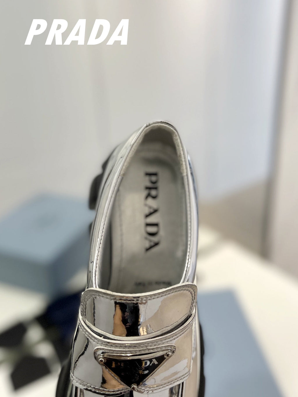 PRADA BRUSHED LEATHER MONOLITH LOAFERS SILVER