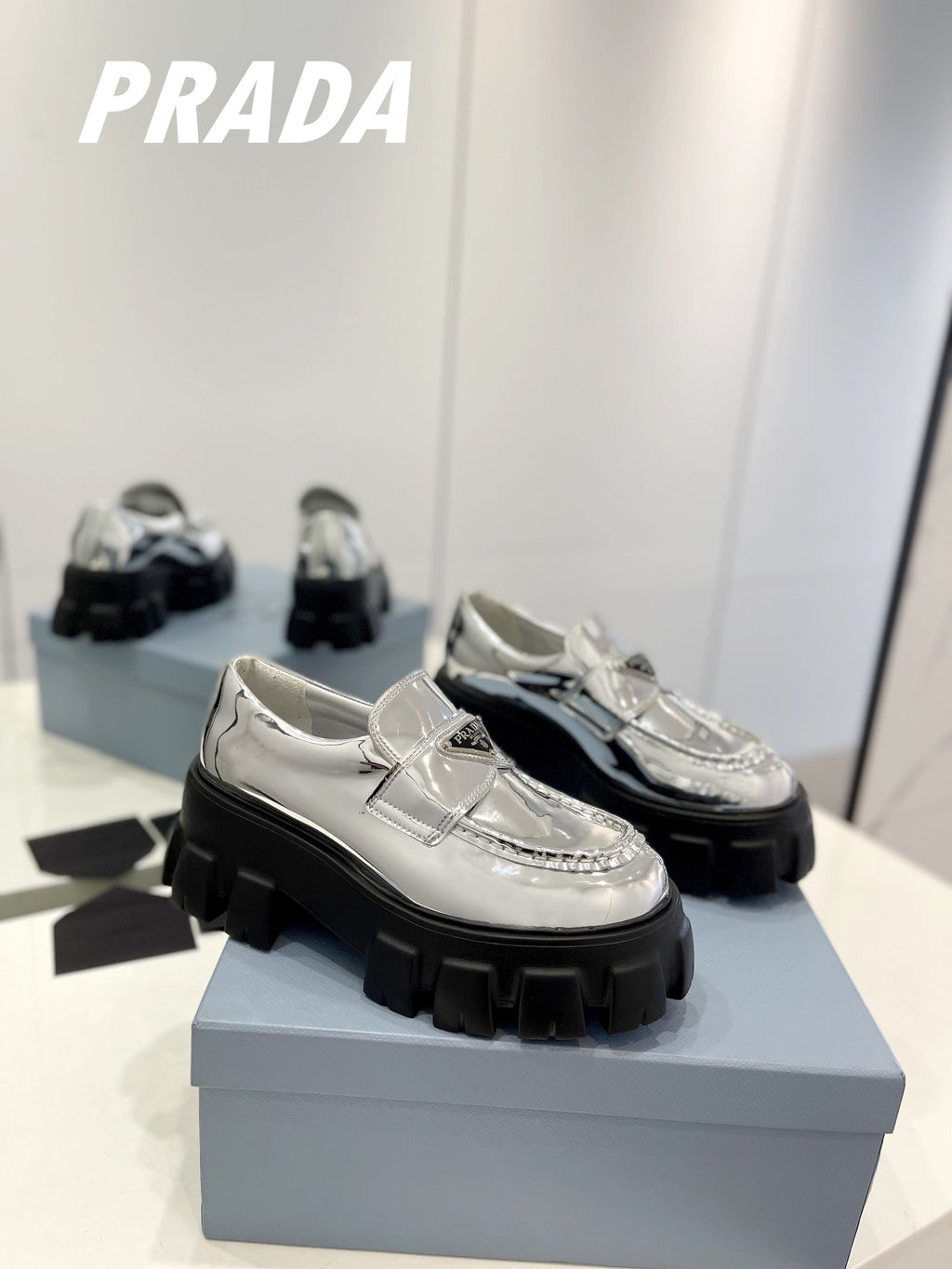 PRADA BRUSHED LEATHER MONOLITH LOAFERS SILVER