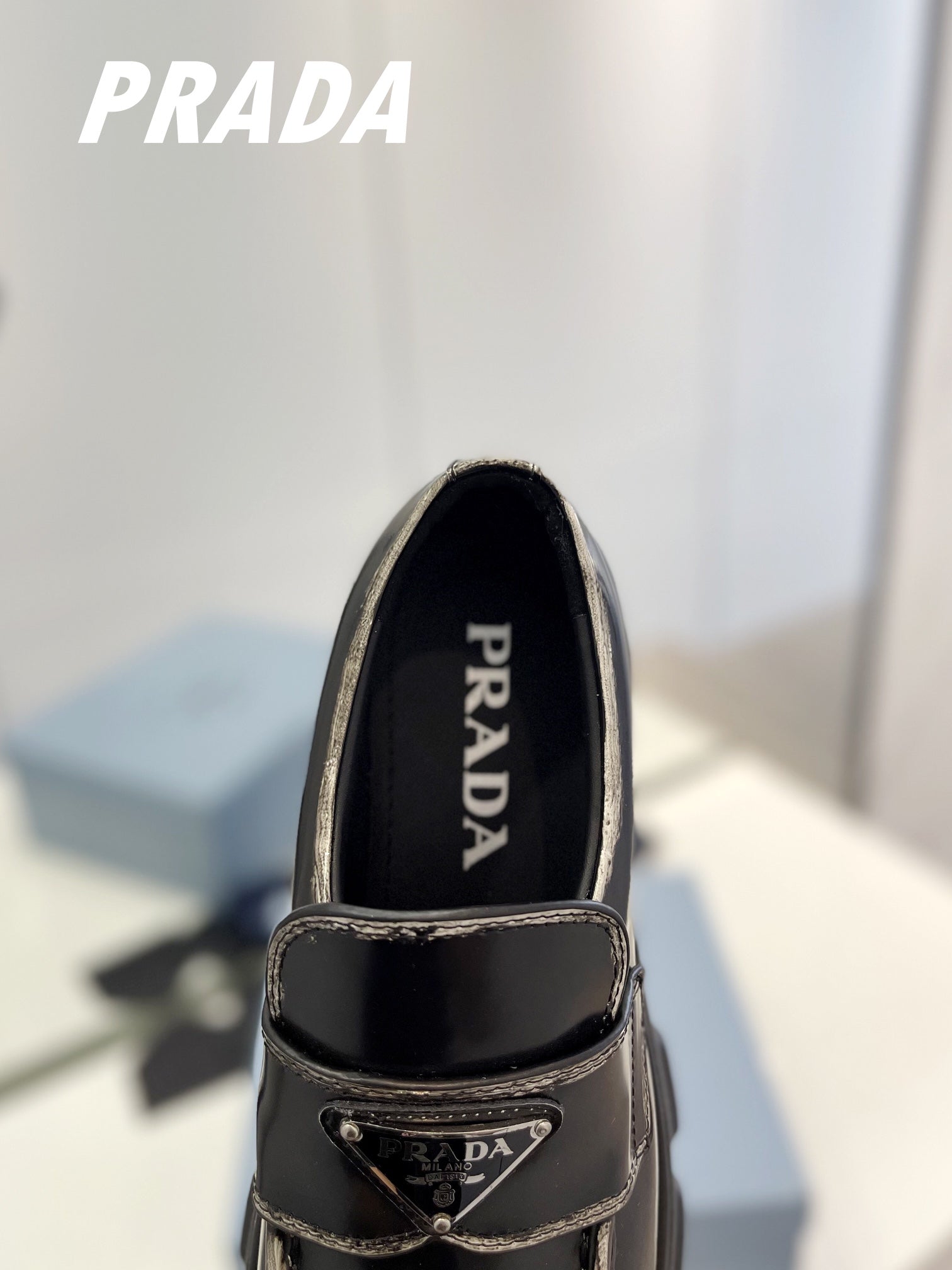 PRADA BRUSHED LEATHER MONOLITH LOAFERS BLACK-SILVER BORDER