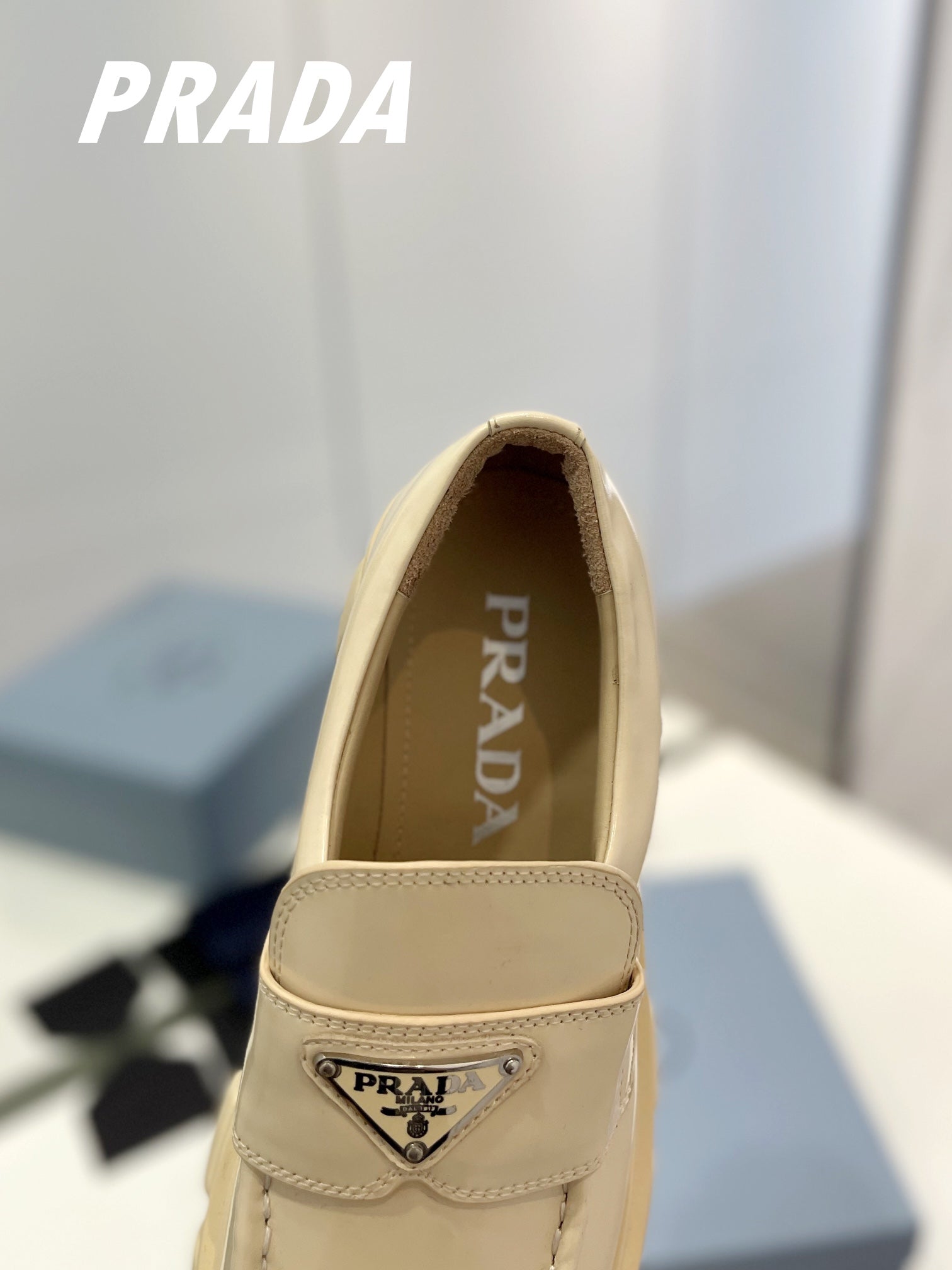 PRADA BRUSHED LEATHER MONOLITH LOAFERS BEIGE