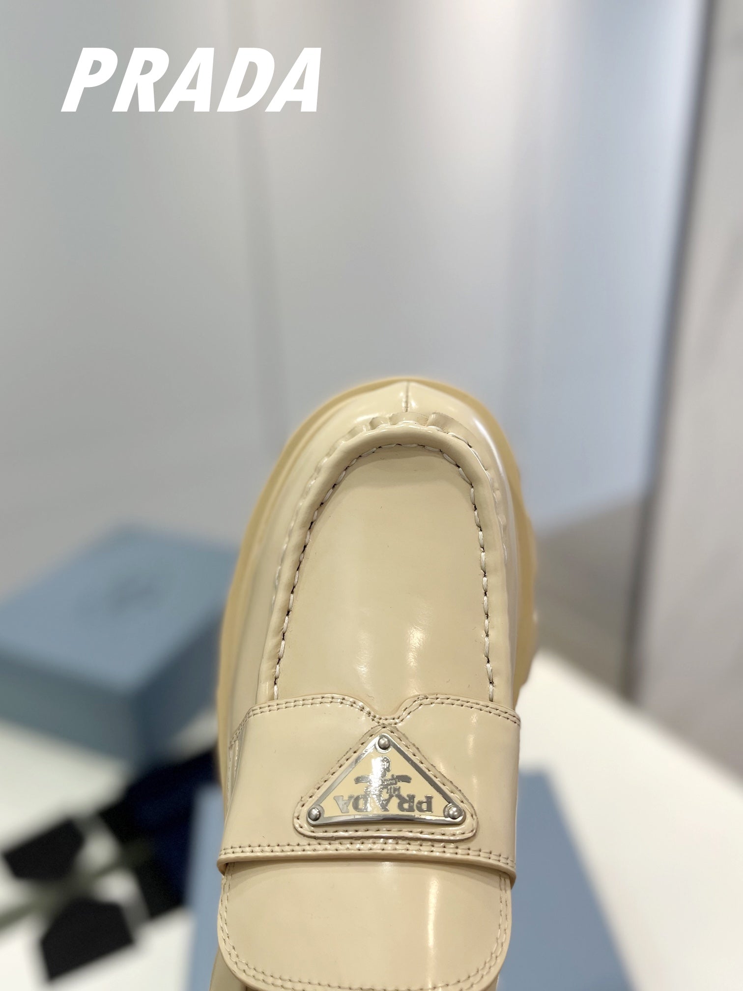 PRADA BRUSHED LEATHER MONOLITH LOAFERS BEIGE
