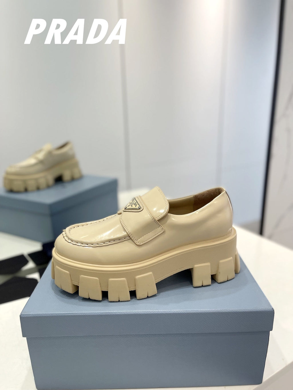 PRADA BRUSHED LEATHER MONOLITH LOAFERS BEIGE