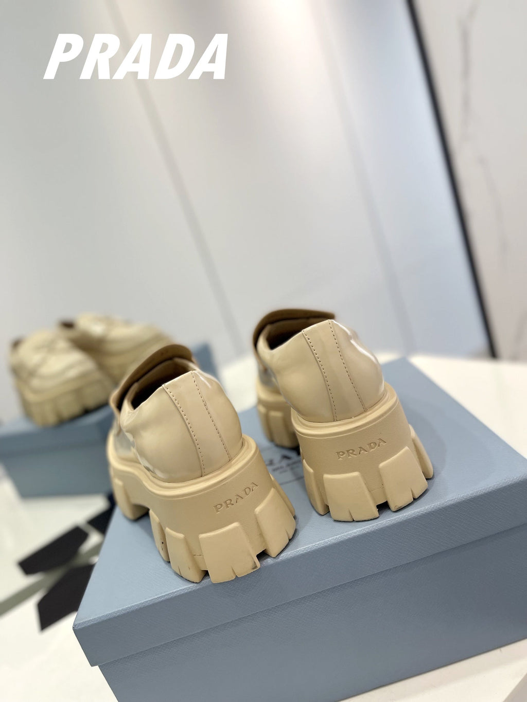 PRADA BRUSHED LEATHER MONOLITH LOAFERS BEIGE