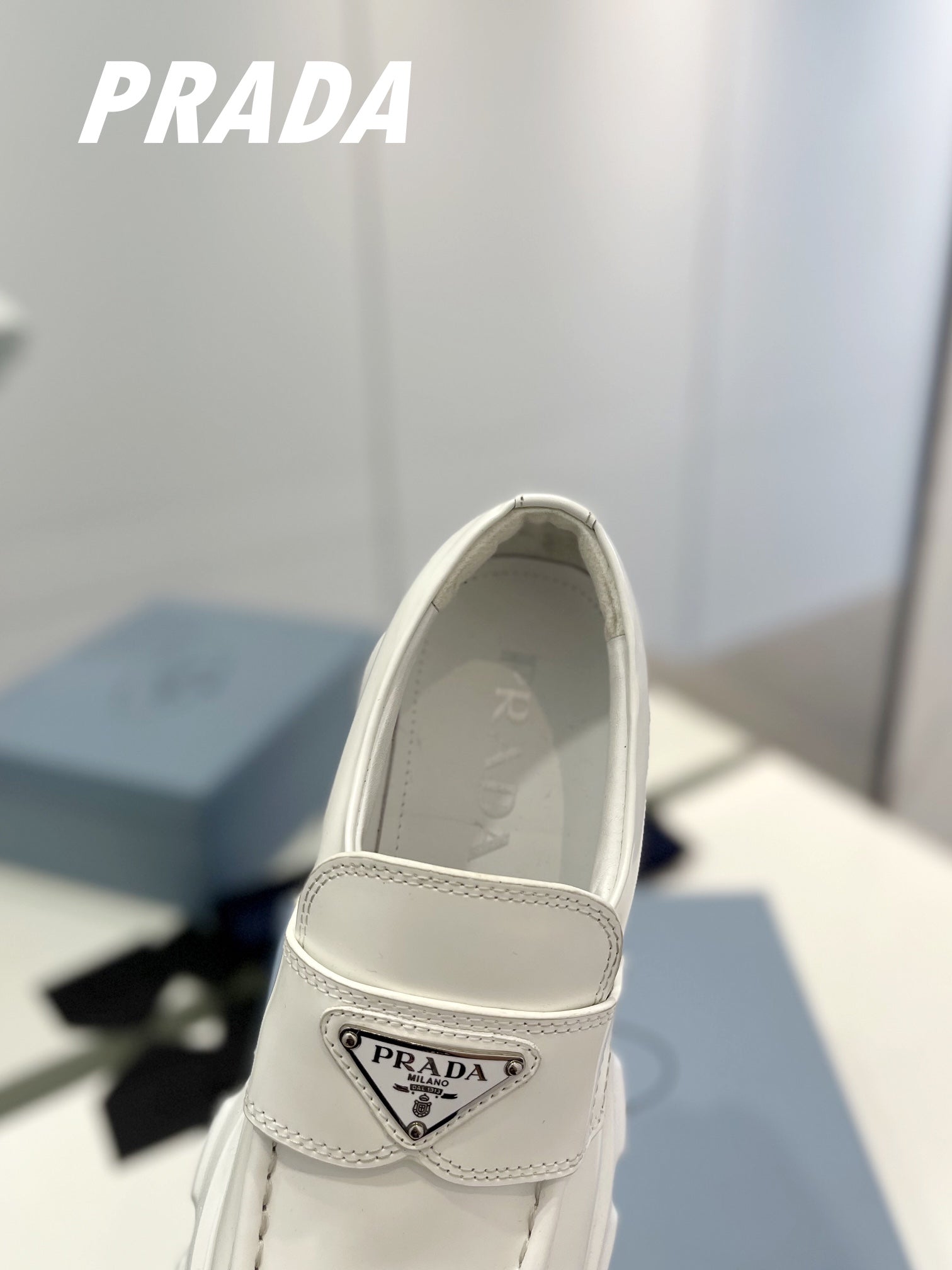 PRADA BRUSHED LEATHER MONOLITH LOAFERS WHITE