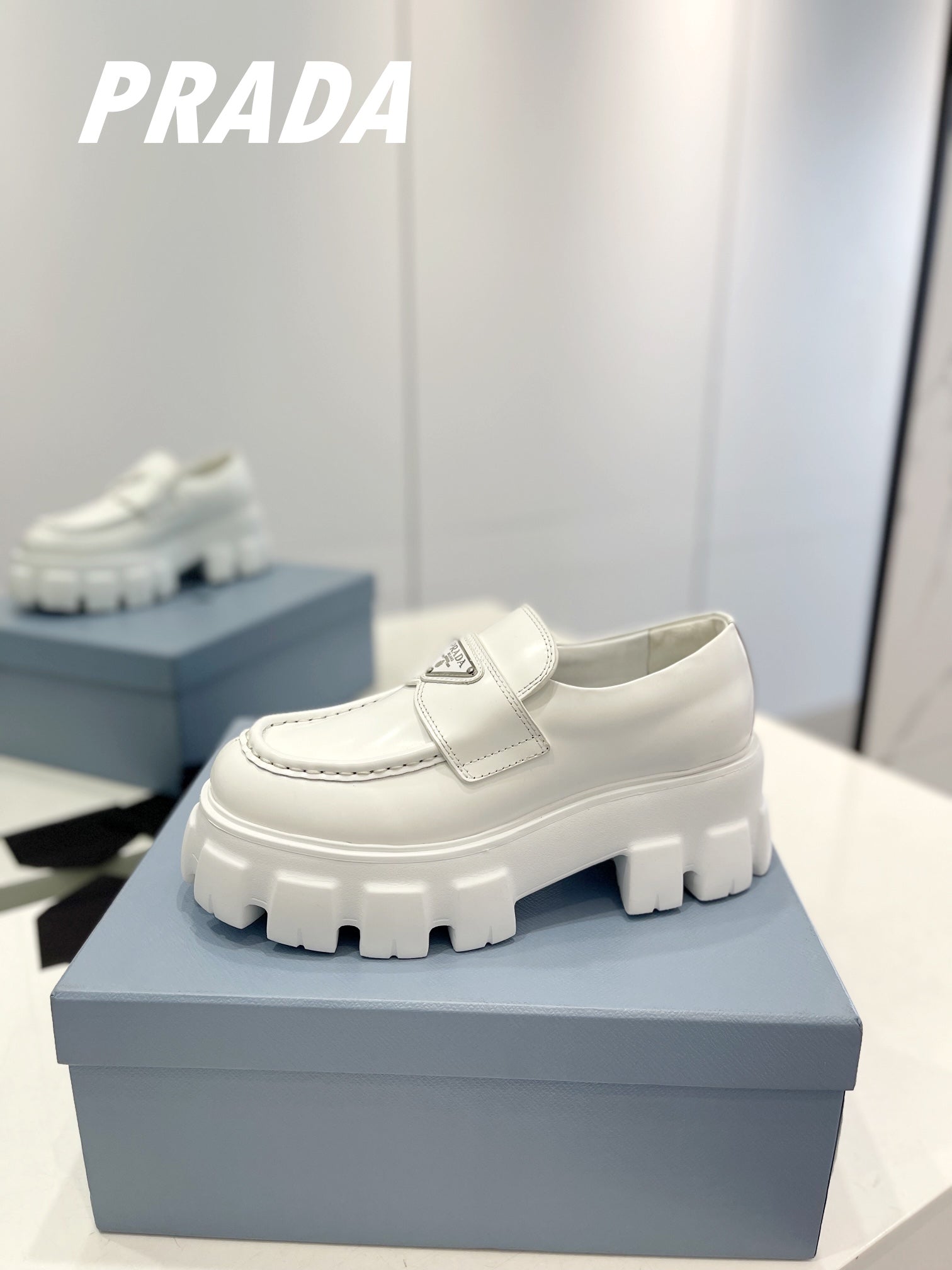 PRADA BRUSHED LEATHER MONOLITH LOAFERS WHITE